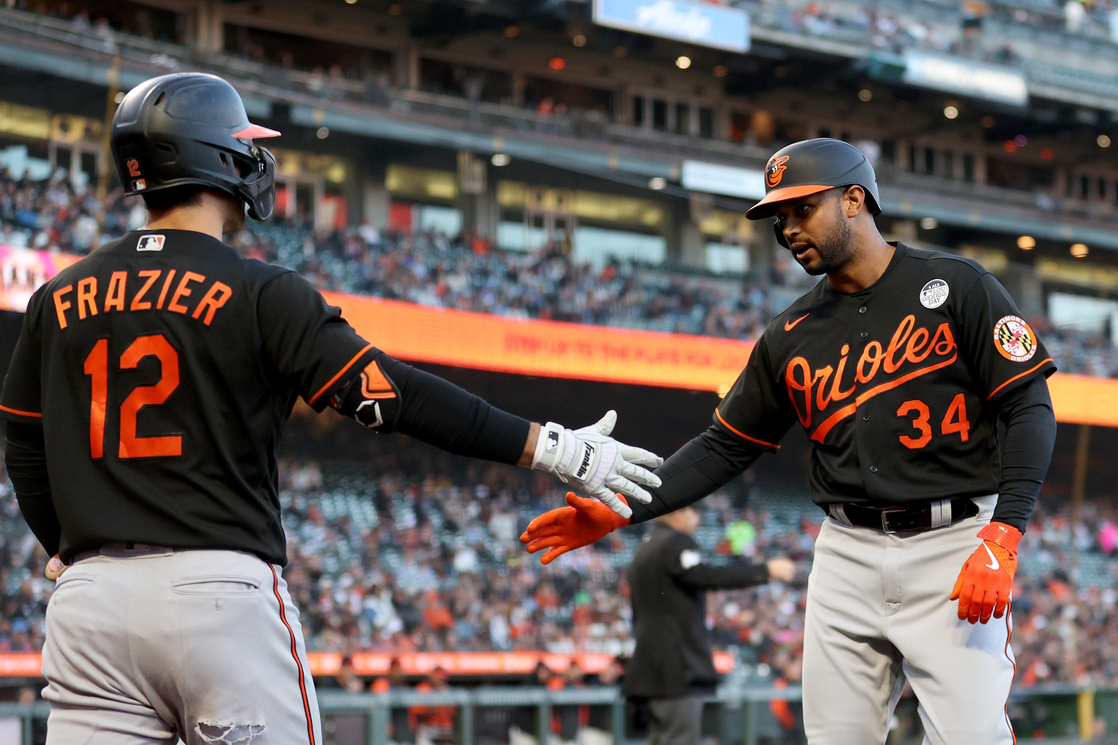 New Oriole Aaron Hicks (right) hit a career-high 27 home runs as a Yankee in 2018.