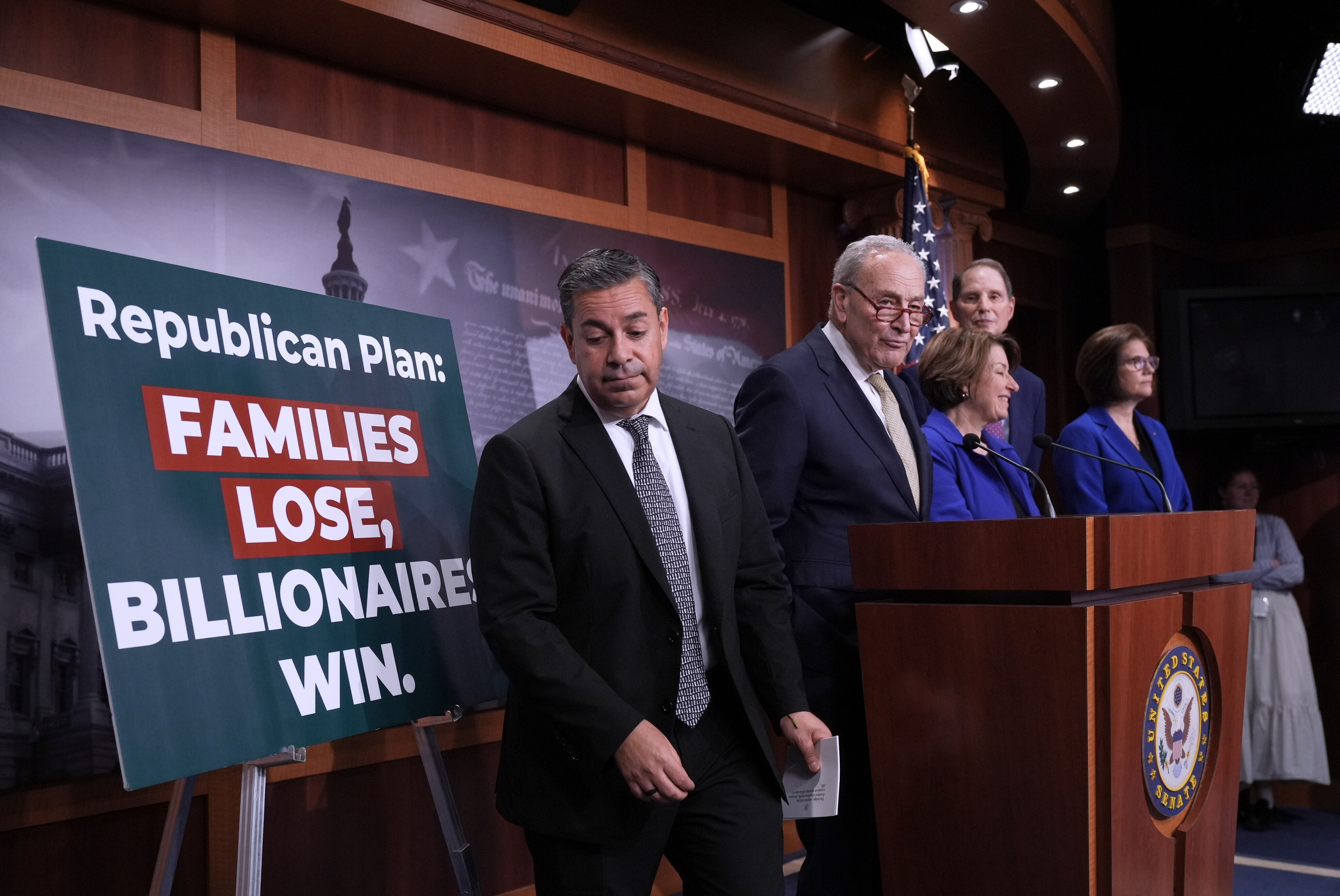 Senate Democrats, from left, Sen. Ben Ray Lujan, D-N.M., Minority Leader Chuck Schumer, D-N.Y., Sen. Amy Klobuchar, D-Minn., Sen. Ron Wyden, D-Ore., and Sen. Catherine Cortez Masto, D-Nev., gather to speak to reporters before the start of a voting marathon as Senate Republicans push the next step to pass President Donald Trump's budget agenda, at the Capitol, in Washington, Friday, April 4, 2025. (AP Photo/J. Scott Applewhite)