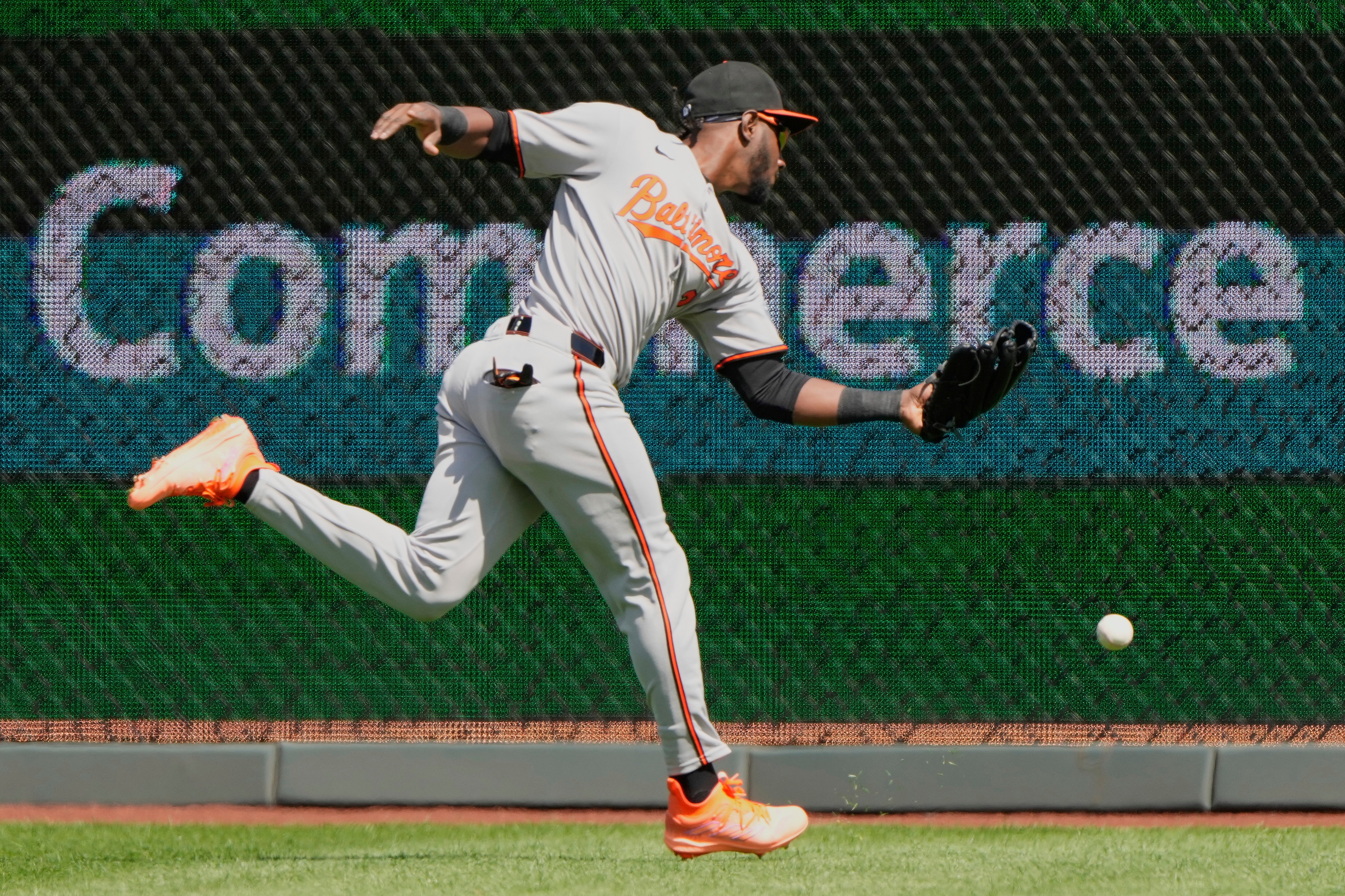 Baltimore Orioles center fielder Jorge Mateo fields a triple hit by Kansas City Royals' Bobby Witt Jr. during the first inning.