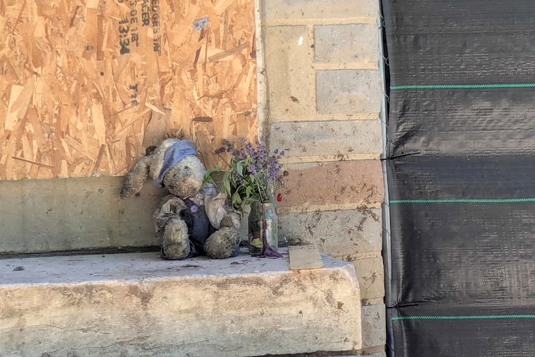 SATURDAY, MAY 30, 2026 - A memorial next dorr to the site of the fatal house fire in the 2200 block of Guilford Avenue in Barclay. The three-alarm fire occurred on Thursday.