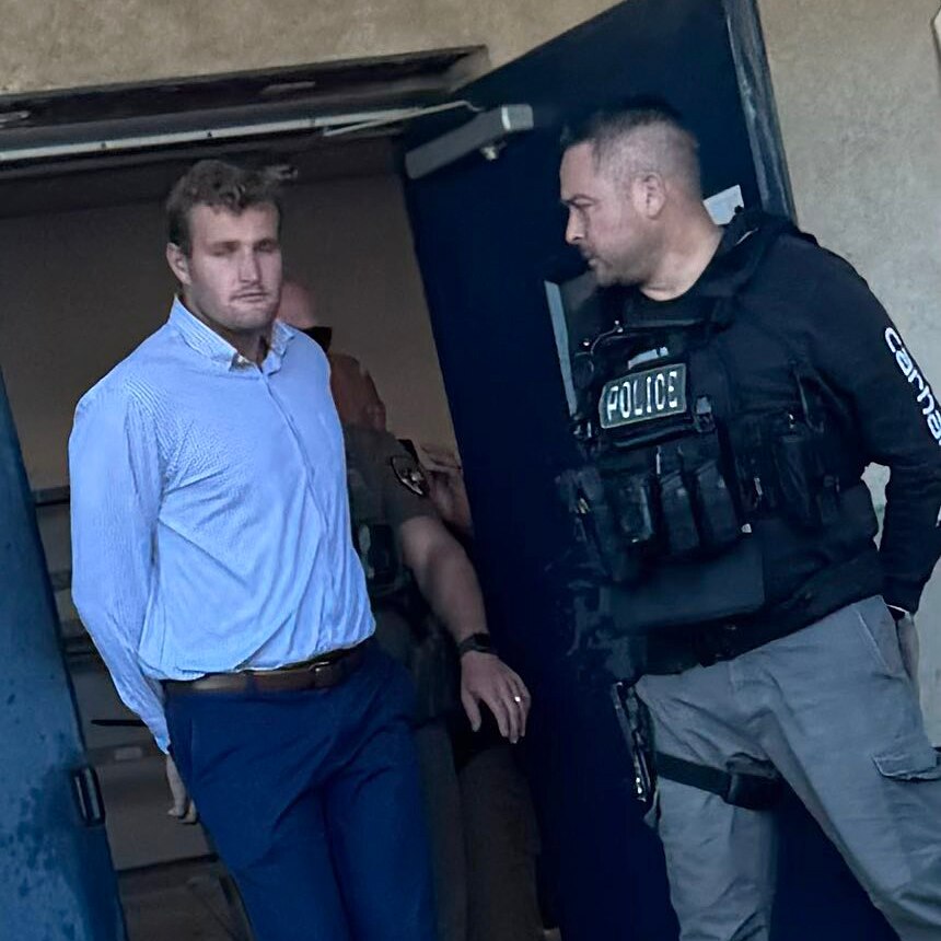 In a photo released on X, Baltimore Police show John Callis after he turned himself in to police custody on Monday.