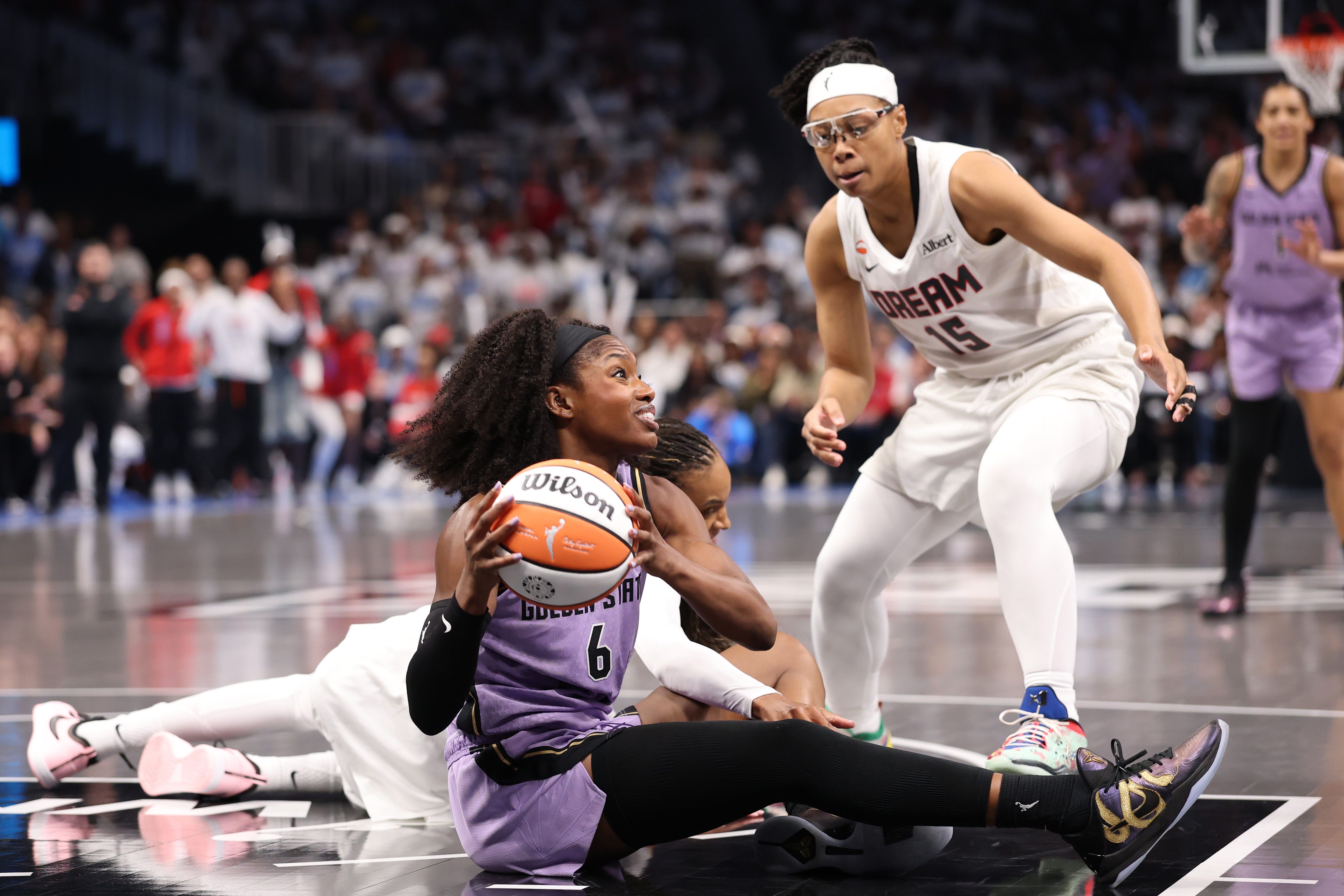 ATLANTA, GEORGIA - OCTOBER 24: Kaila Charles #6 of the Golden State Valkyries looks to pass the ball against Allisha Gray #15 and DeWanna Bonner #24 of the Atlanta Dream during the third quarter in game four of the 2026 WNBA Finals at State Farm Arena on October 24, 2026 in Atlanta, Georgia. NOTE TO USER: User expressly acknowledges and agrees that, by downloading and or using this photograph, User is consenting to the terms and conditions of the Getty Images License Agreement. (Photo by Kevin C. Cox/Getty Images)