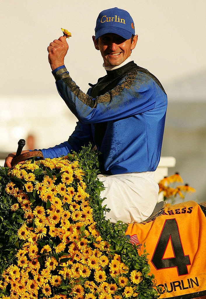Robby Albarado celebrates atop Curlin in the winner's circle after winning the 132nd Preakness Stakes on May 19, 2007 at Pimlico Race Course in Baltimore. Albarado has died at the age of 52.