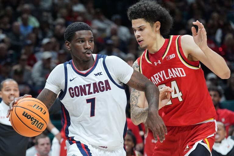 Gonzaga guard Tyon Grant-Foster (7) drives around Maryland forward Aleks Alston (24) during the first half.