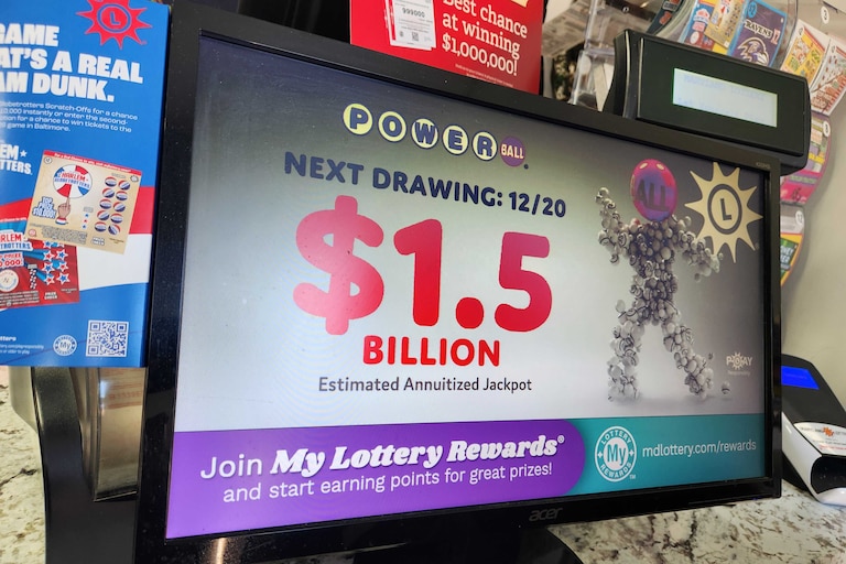 Marylanders buy tickets at Triple Fam Mart in Mount Vernon on Saturday, Dec. 20, 2025, ahead of the $1.5 billion Powerball drawing.