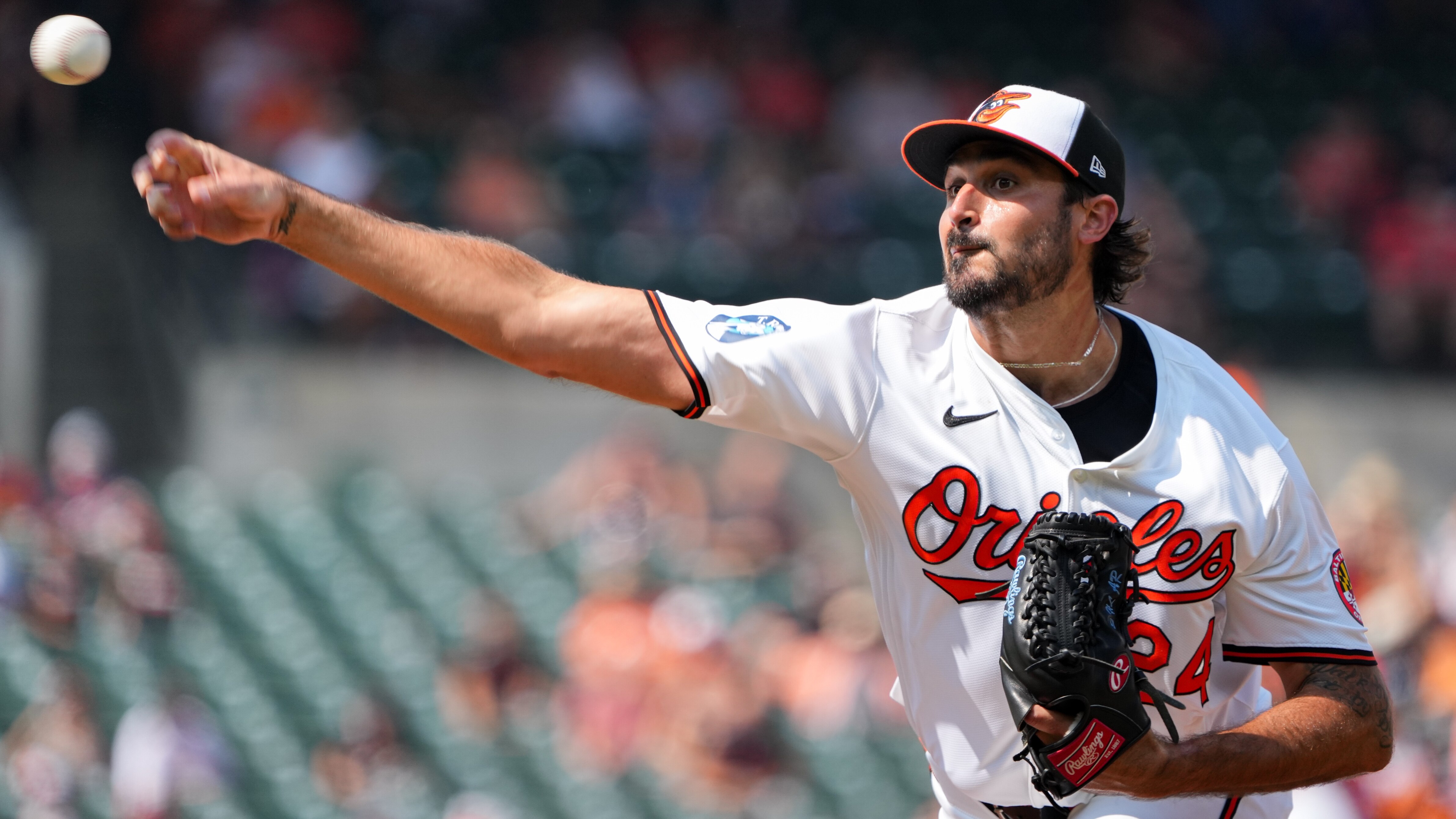 Baltimore Orioles pitcher Zach Eflin (24) delivers a pitch during a baseball game against the Toronto Blue Jays at Camden Yards on July 29, 2024.