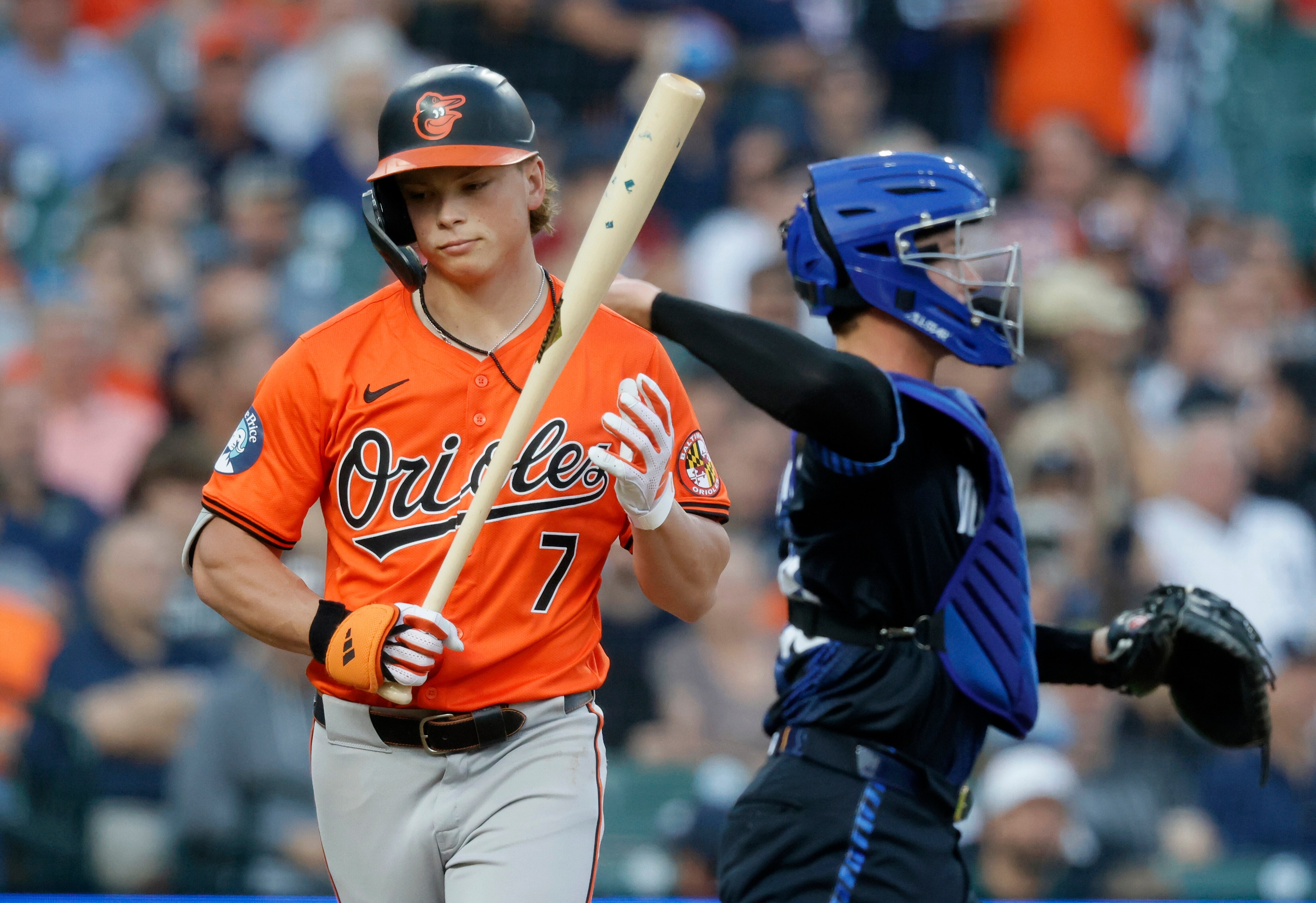 Jackson Holliday #7 of the Baltimore Orioles heads for the dugout after being called out on strikes during the third inning of the game against the Detroit Tigers at Comerica Park on September 13, 2024 in Detroit, Michigan.
