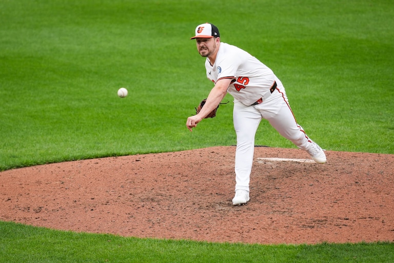 Baltimore Orioles pitcher Keegan Akin (45) delivers a pitch during the team’s home opening game against the Boston Red Sox at Oriole Park at Camden Yards in Baltimore, Md. on Monday, March 31, 2025.