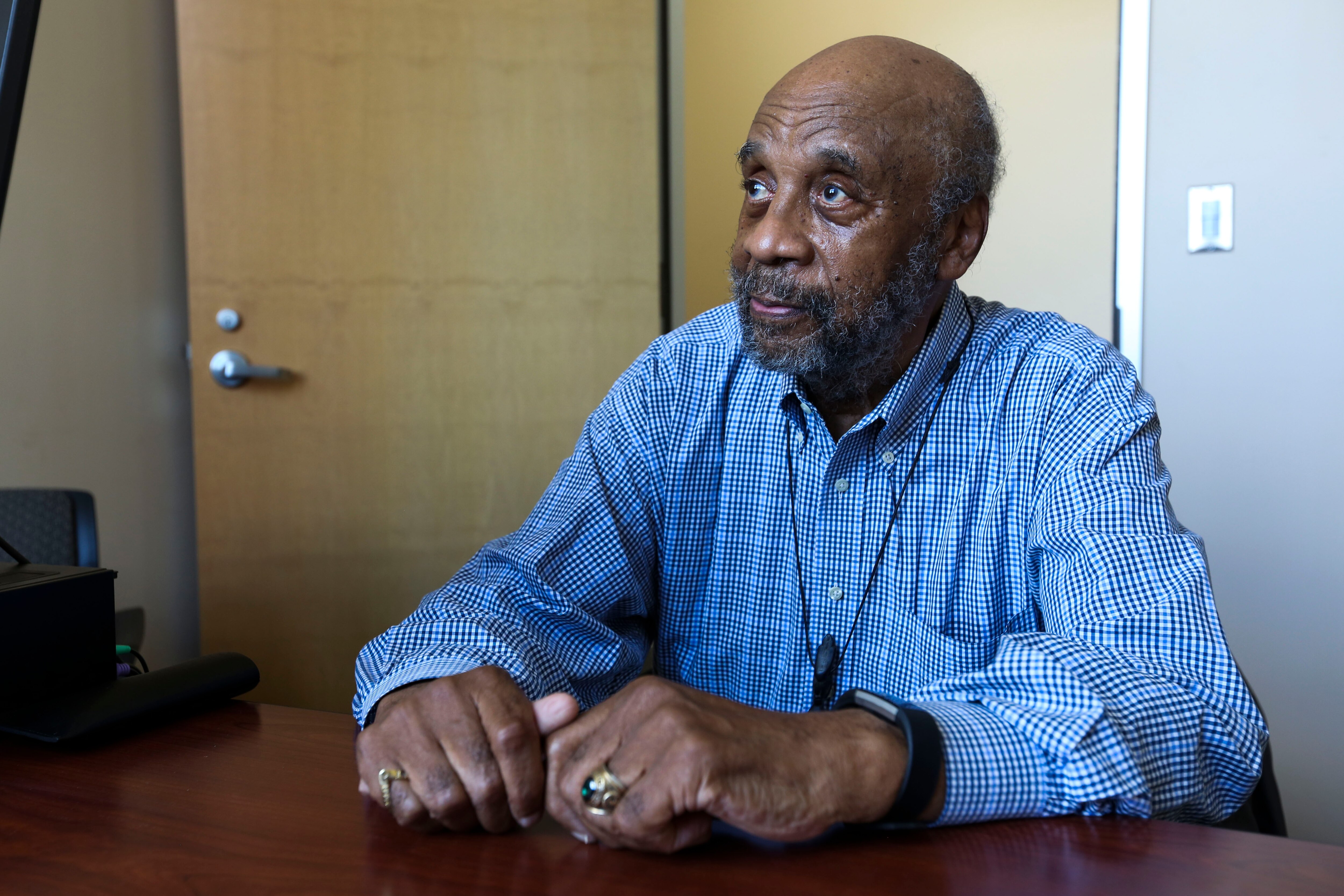Dr. Warren C. Hayman has influenced countless Black students pursue higher education opportunities. He retired from his position of Assistant Dean of Education at Morgan State University in 2004 after 42 years in public education, which included starting the The Hopkins Dunbar Health Partnership, where dozens of Black people went onto professional medical careers. He is pictured here in front of dedicated bricks at Morgan State.