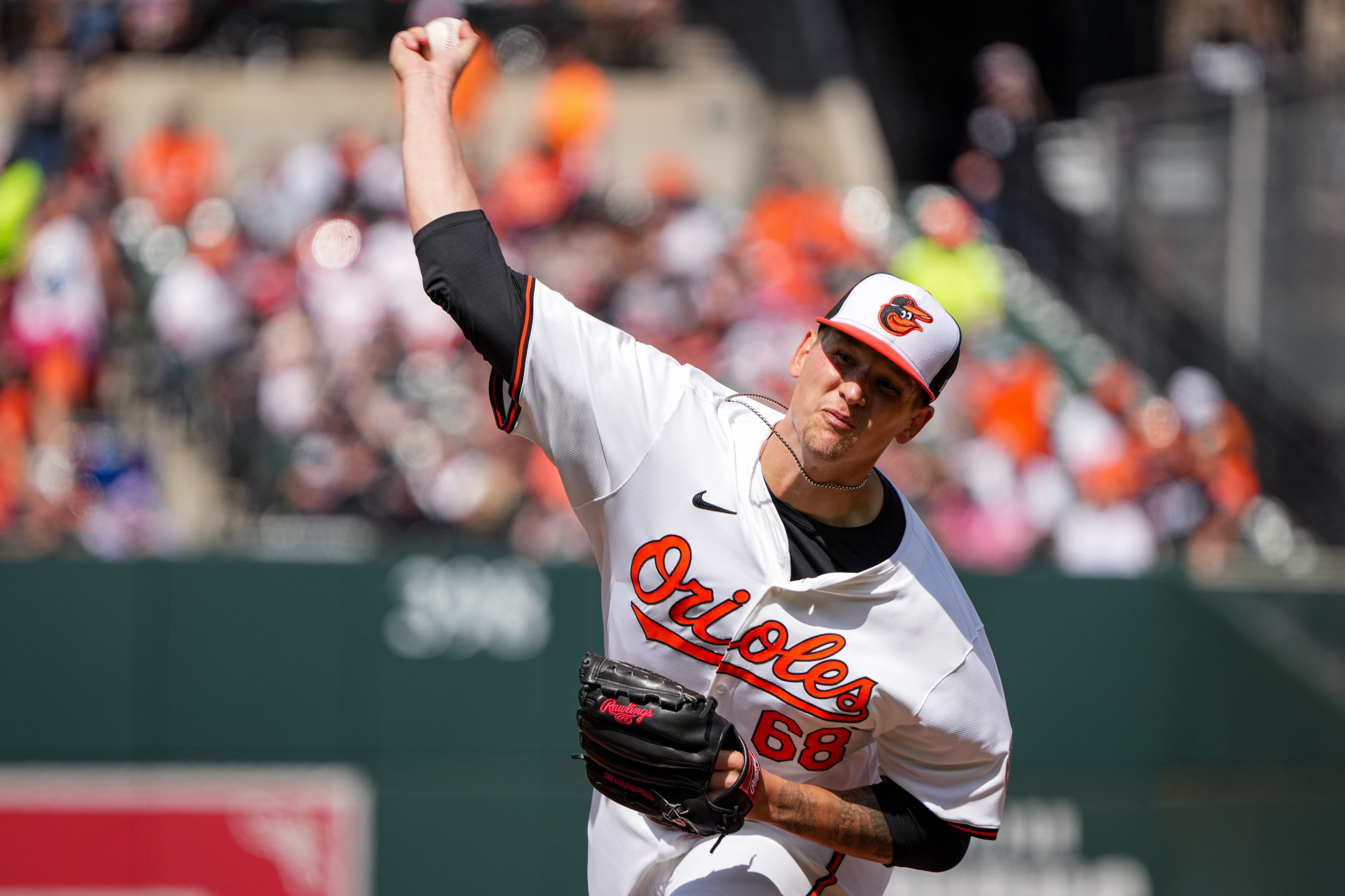 Baltimore Orioles starting pitcher Tyler Wells (68) delivers a pitch in a game against the Los Angeles Angels on March 31.