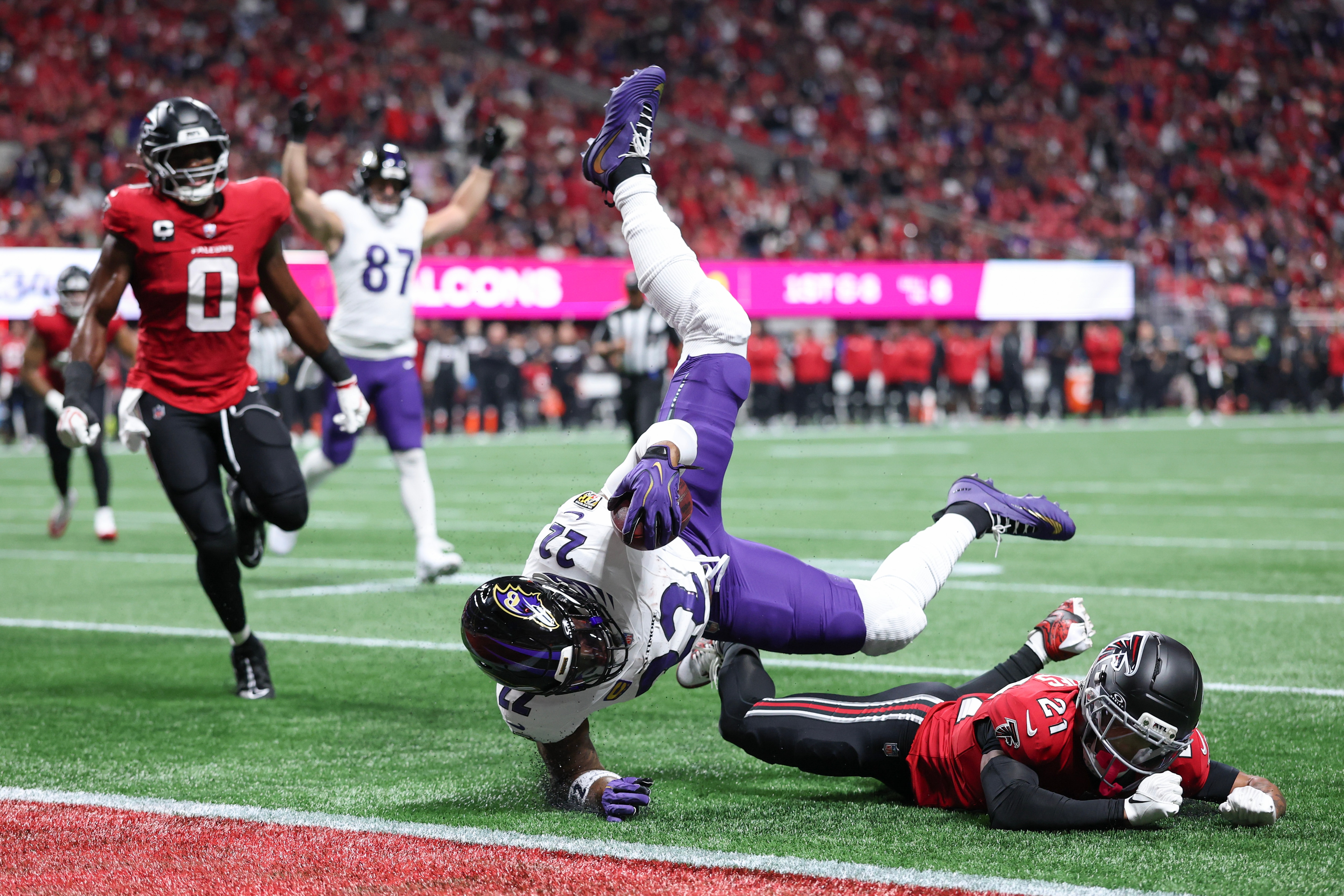 Mike Hughes of the Atlanta Falcons tackles Baltimore Ravens running back Derrick Henry short of the end zone in the first quarter on Sunday.