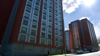 FRIDAY, APRIL 17, 2026 - Tower C residence hall, right, was the dorm at Towson University where a man accidentally shot himself in the leg. Police responded quickly and no students were injured.