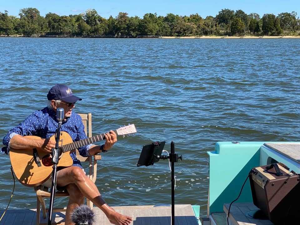 Jimmy Buffett singing aboard his sailboat Drifter off Annapolis while recording songs for a 2020 concert intended for release during the COVID pandemic.