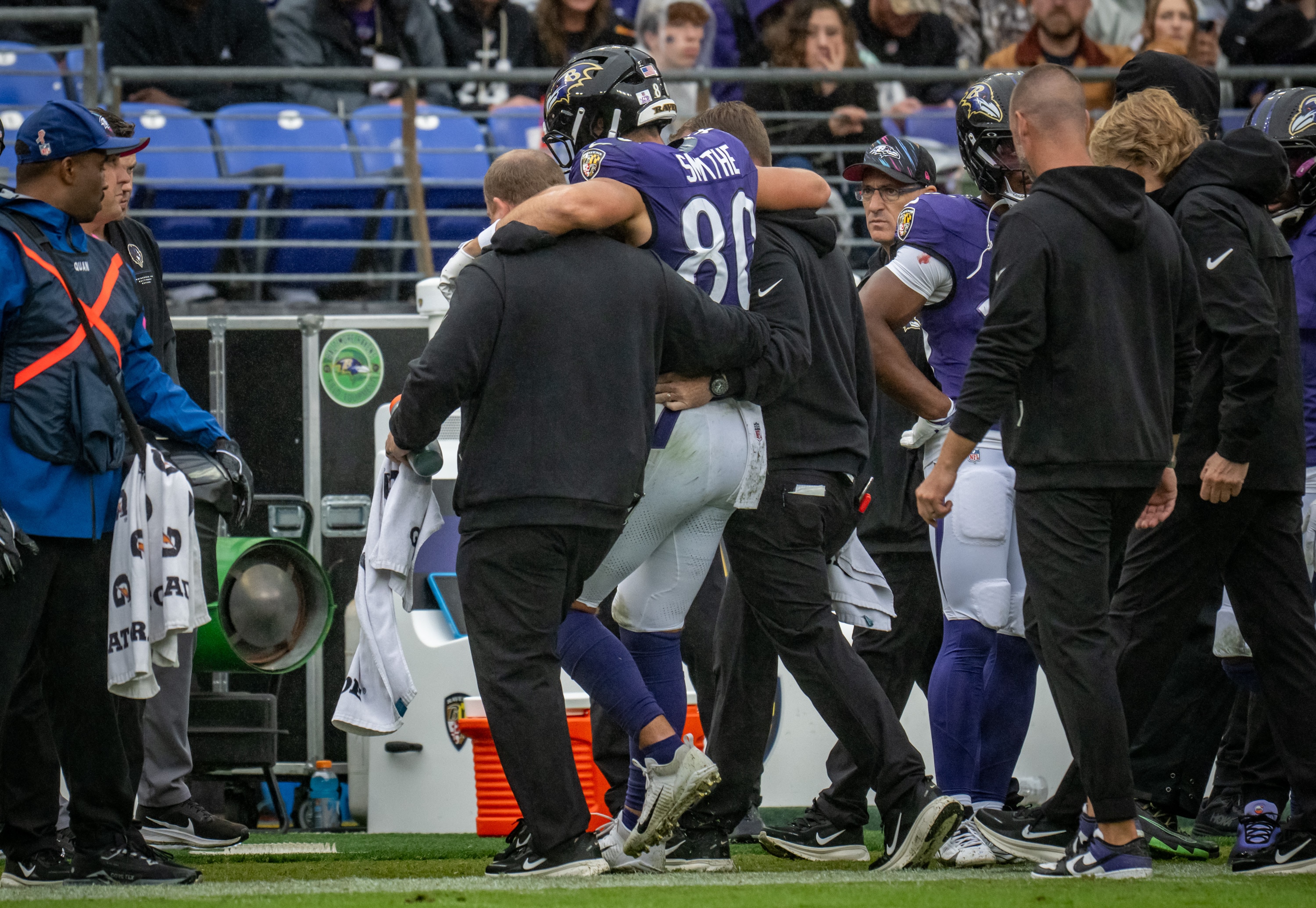 Ravens tight end Durham Smythe is helped off the field after being injured in Sunday’s win over the Tennessee Titans.