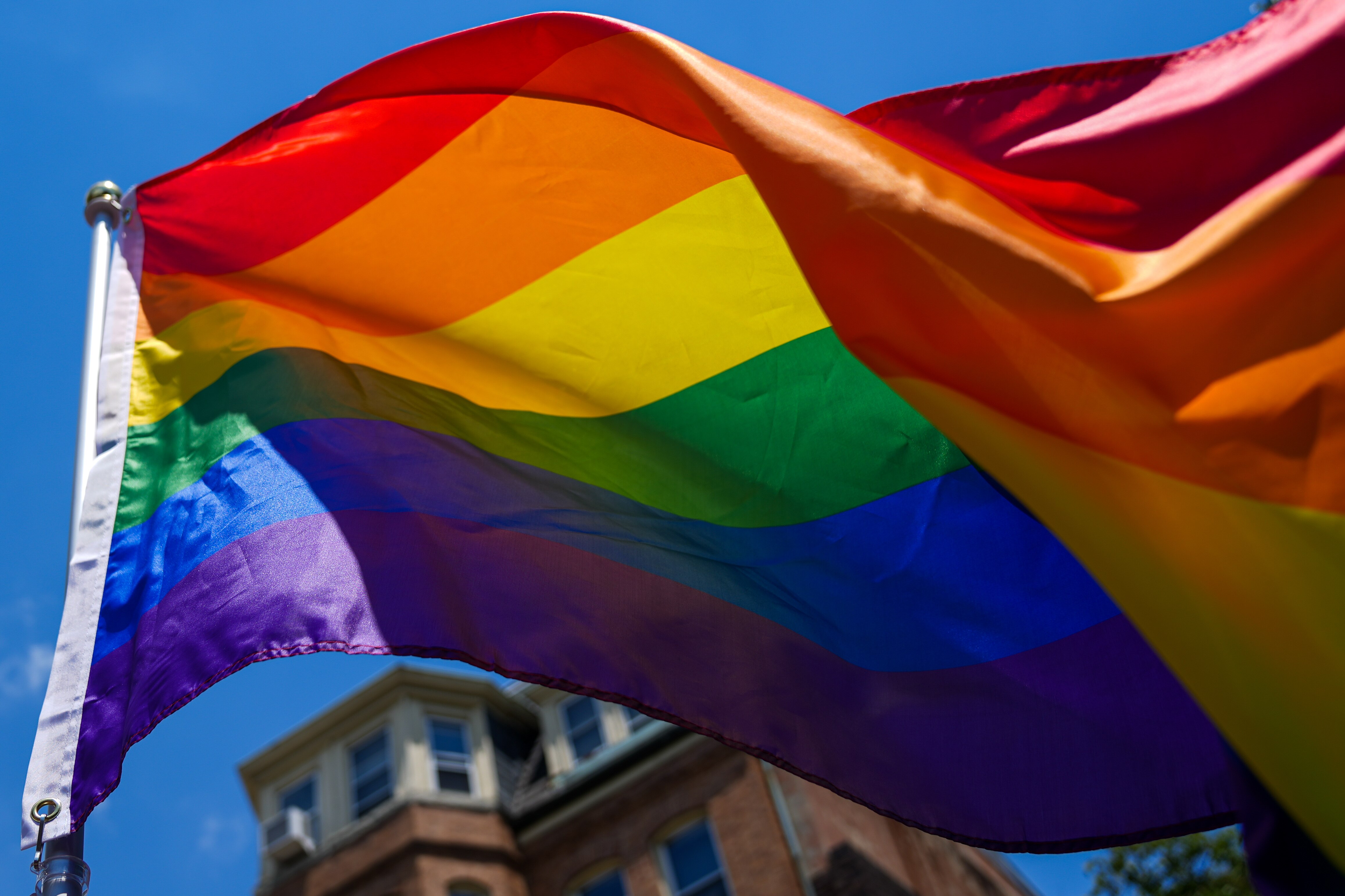 6/25/22—A rainbow flag waves during the Baltimore Pride Parade on Charles St.