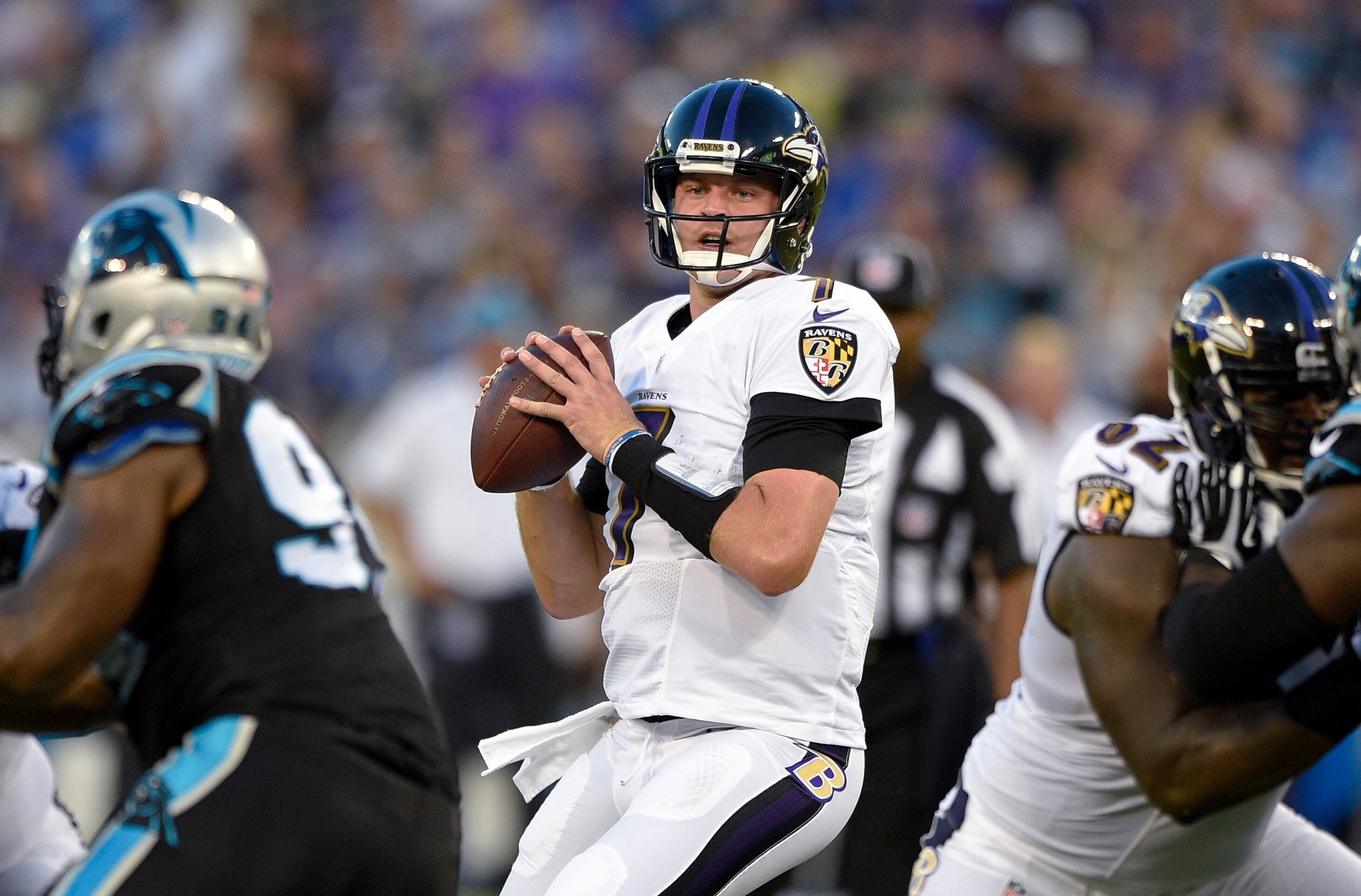Baltimore Ravens quarterback Ryan Mallett looks to pass during the first half of an NFL preseason football game against the Carolina Panthers on Aug. 11, 2016 in Baltimore, Maryland. Mallett, who played for New England, Houston and Baltimore during five seasons in the NFL, has died at age 35.