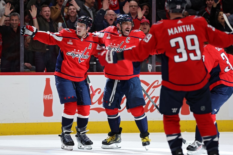 John Carlson #74 of the Washington Capitals celebrates his goal with teammate Alex Ovechkin #8 of the Washington Capitals against the Philadelphia Flyers during the second period at Capital One Arena on March 1, 2024 in Washington, D.C.