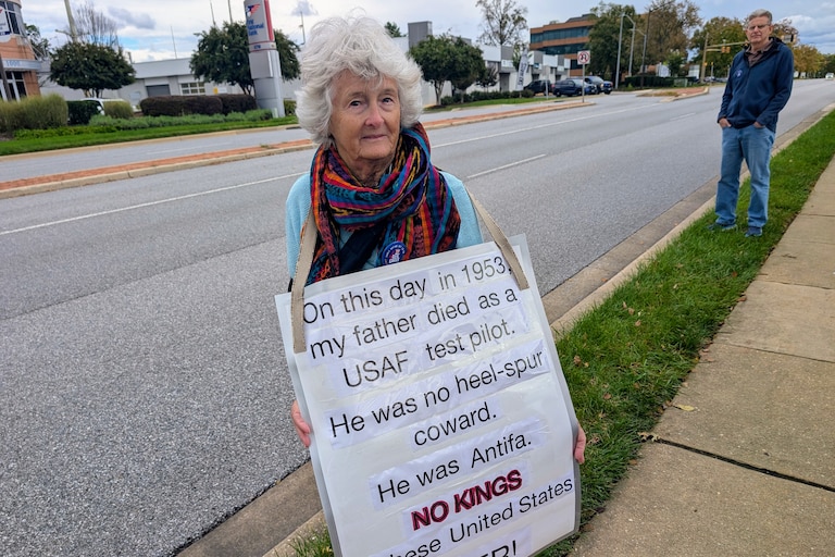 Peggy Donald came out to commemorate her father's death in a 1953 Air Force Crash in Florida. Sometimes signs can be effective up close, too.