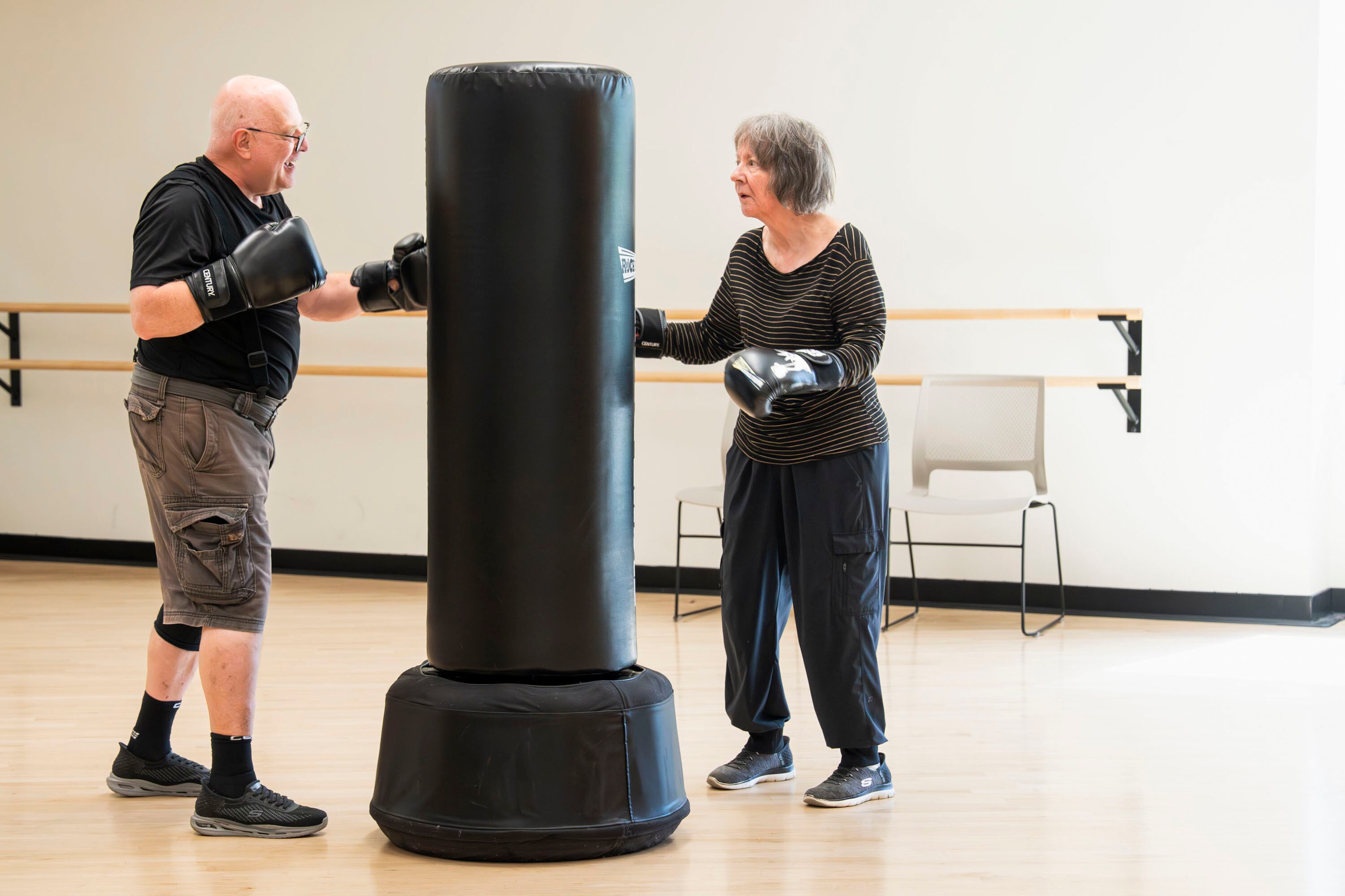 David Ryan, 73, and his wife, Susanne Stahley, 75, participate in a Rock Steady Boxing class for people with Parkinson’s disease.