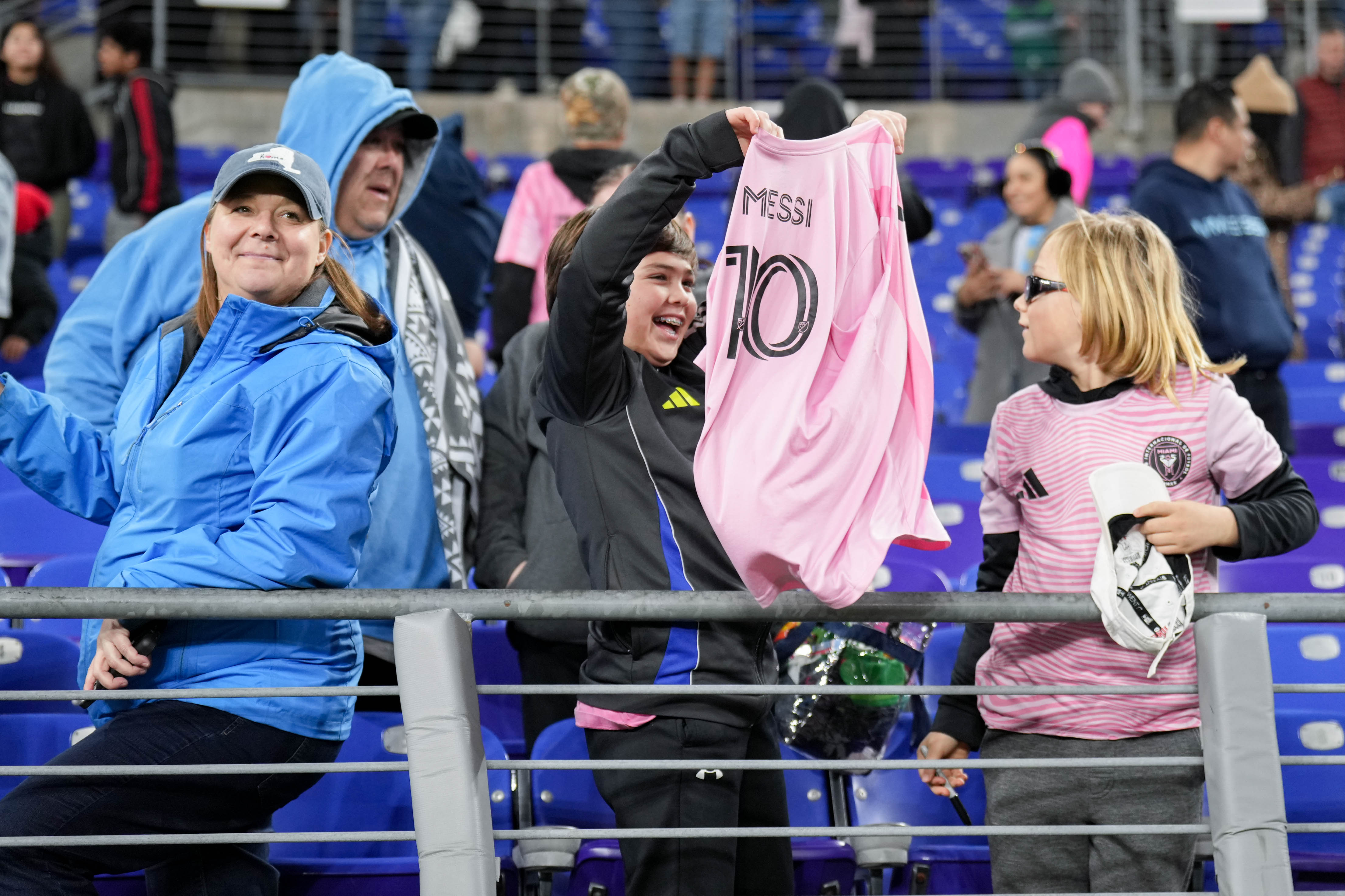 Fans of Inter Miami forward Lionel Messi following an MLS match between D.C. United and Inter Miami in Baltimore in March.