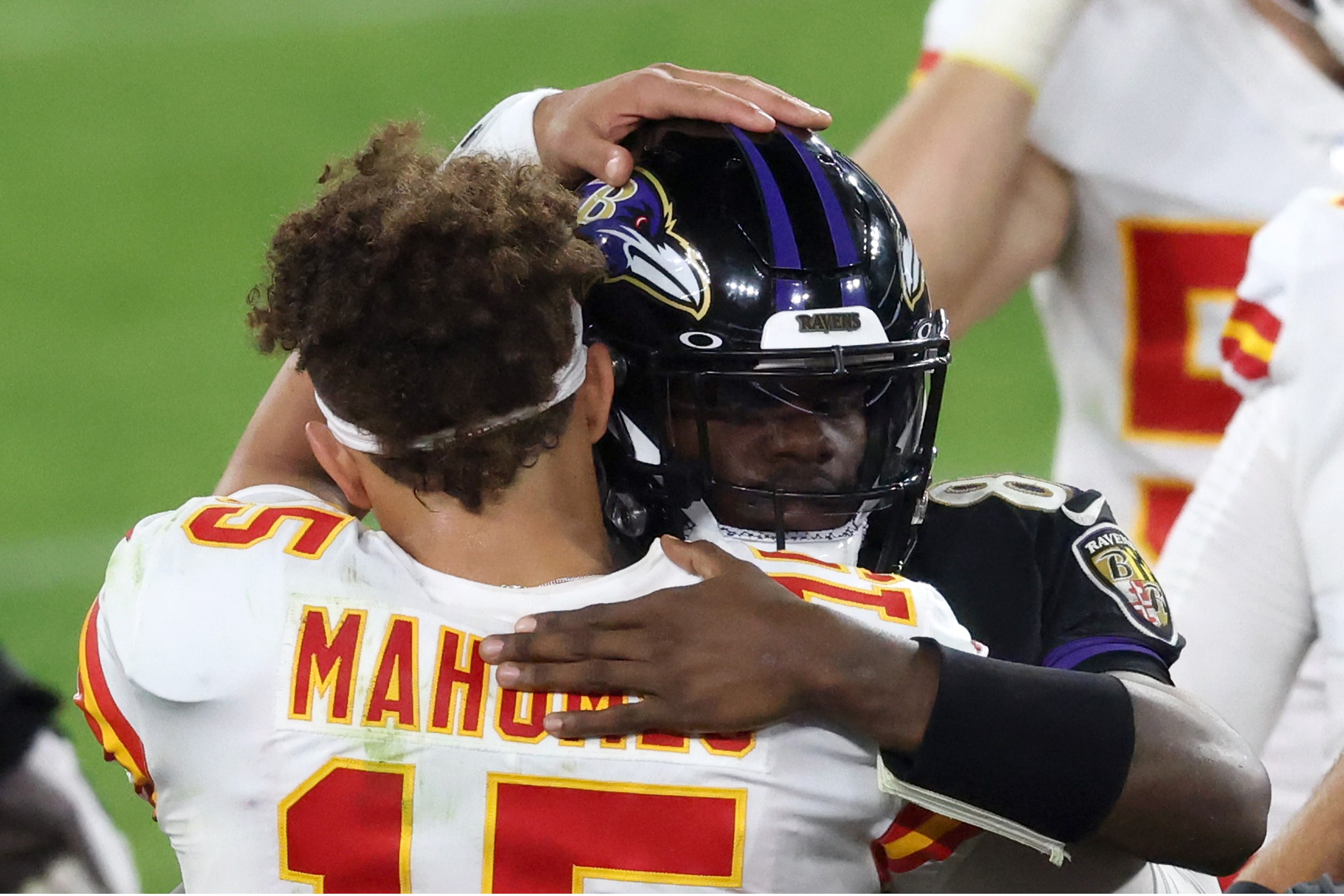 BALTIMORE, MARYLAND - SEPTEMBER 28: Quarterbacks Patrick Mahomes #15 of the Kansas City Chiefs and Lamar Jackson #8 of the Baltimore Ravens hug following the Chiefs win at M&T Bank Stadium on September 28, 2020 in Baltimore, Maryland.