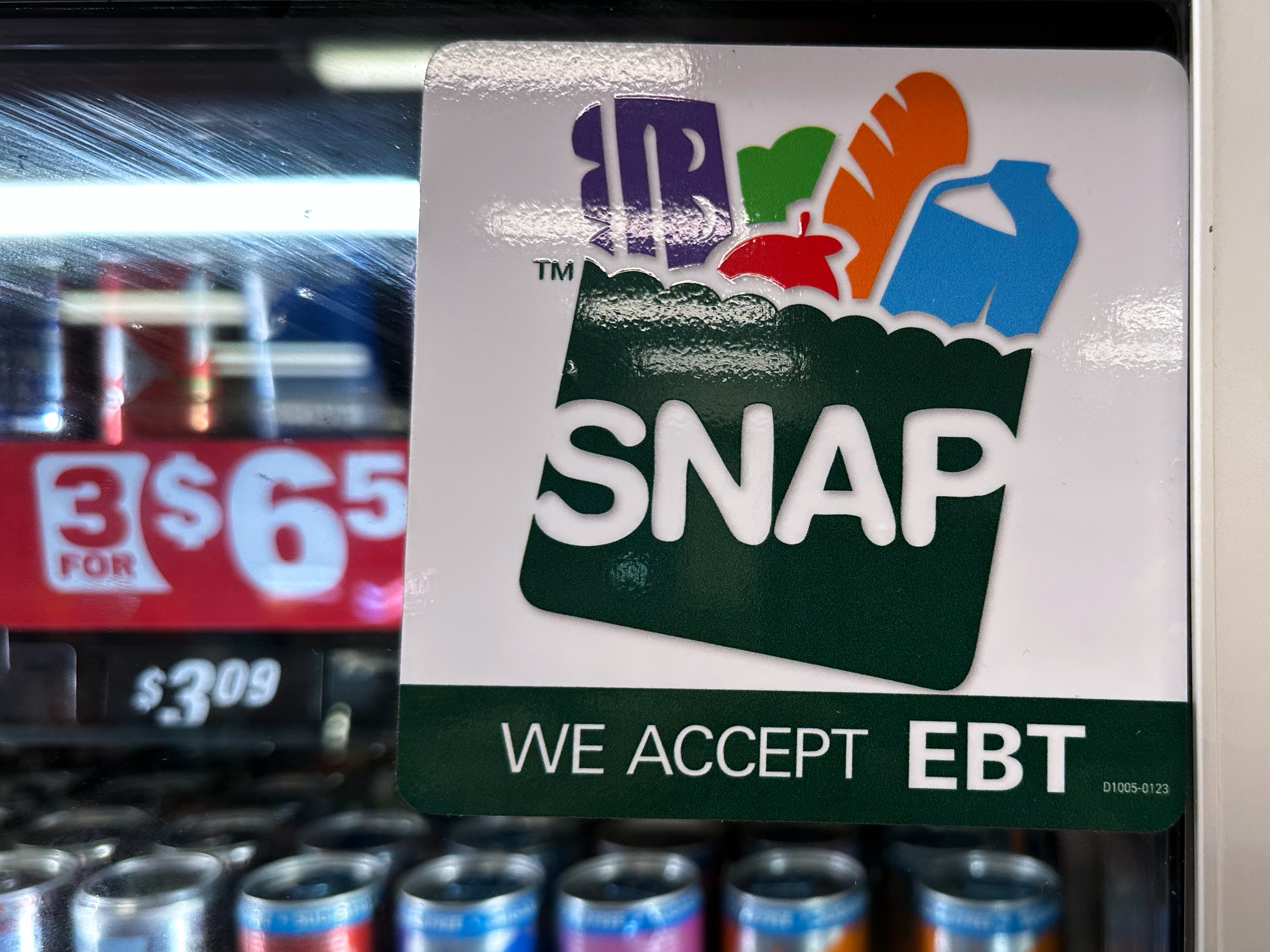 FILE - SNAP EBT information sign is displayed at a gas station in Riverwoods, Ill., Saturday, Nov. 1, 2025. (AP Photo/Nam Y. Huh, file)