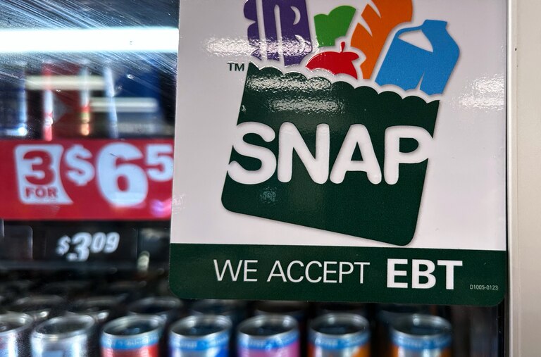 FILE - SNAP EBT information sign is displayed at a gas station in Riverwoods, Ill., Saturday, Nov. 1, 2025. (AP Photo/Nam Y. Huh, file)