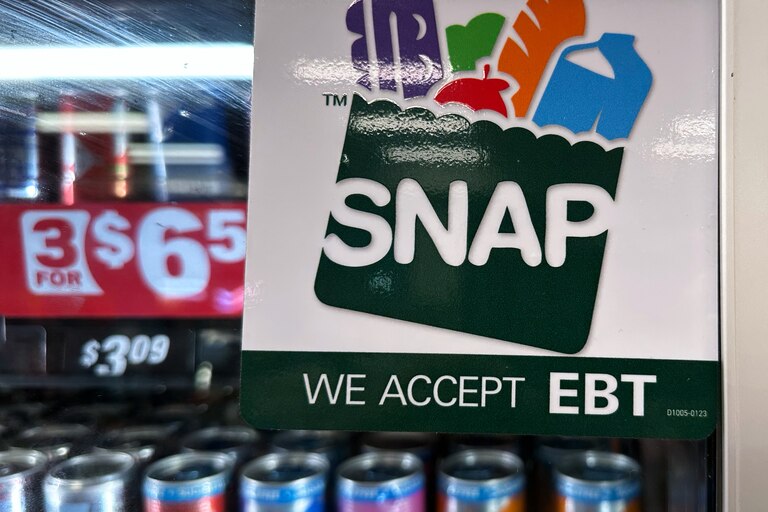 FILE - SNAP EBT information sign is displayed at a gas station in Riverwoods, Ill., Saturday, Nov. 1, 2025. (AP Photo/Nam Y. Huh, file)