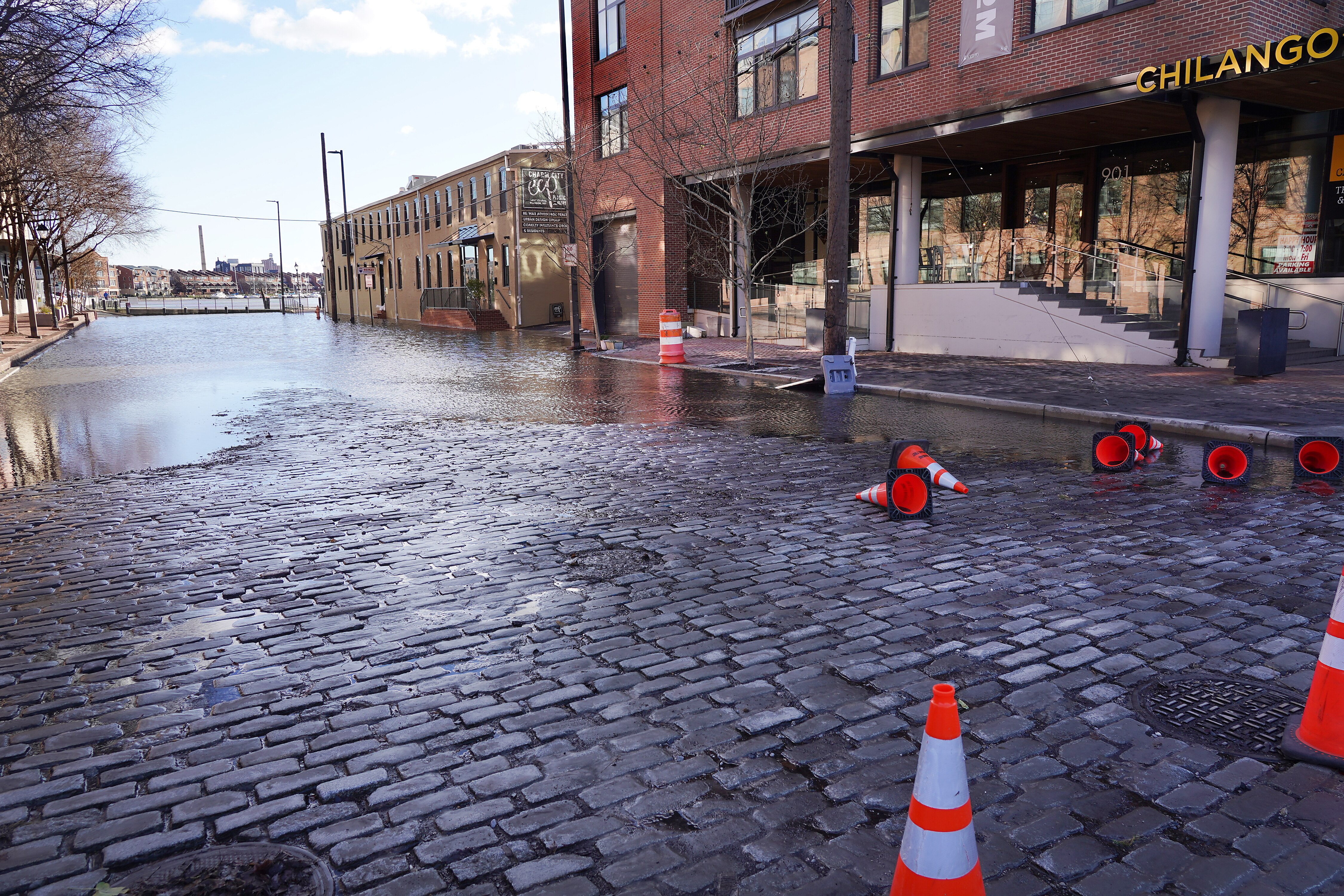 The 1900 block of Thames Street was still underwater at Wolfe Street.