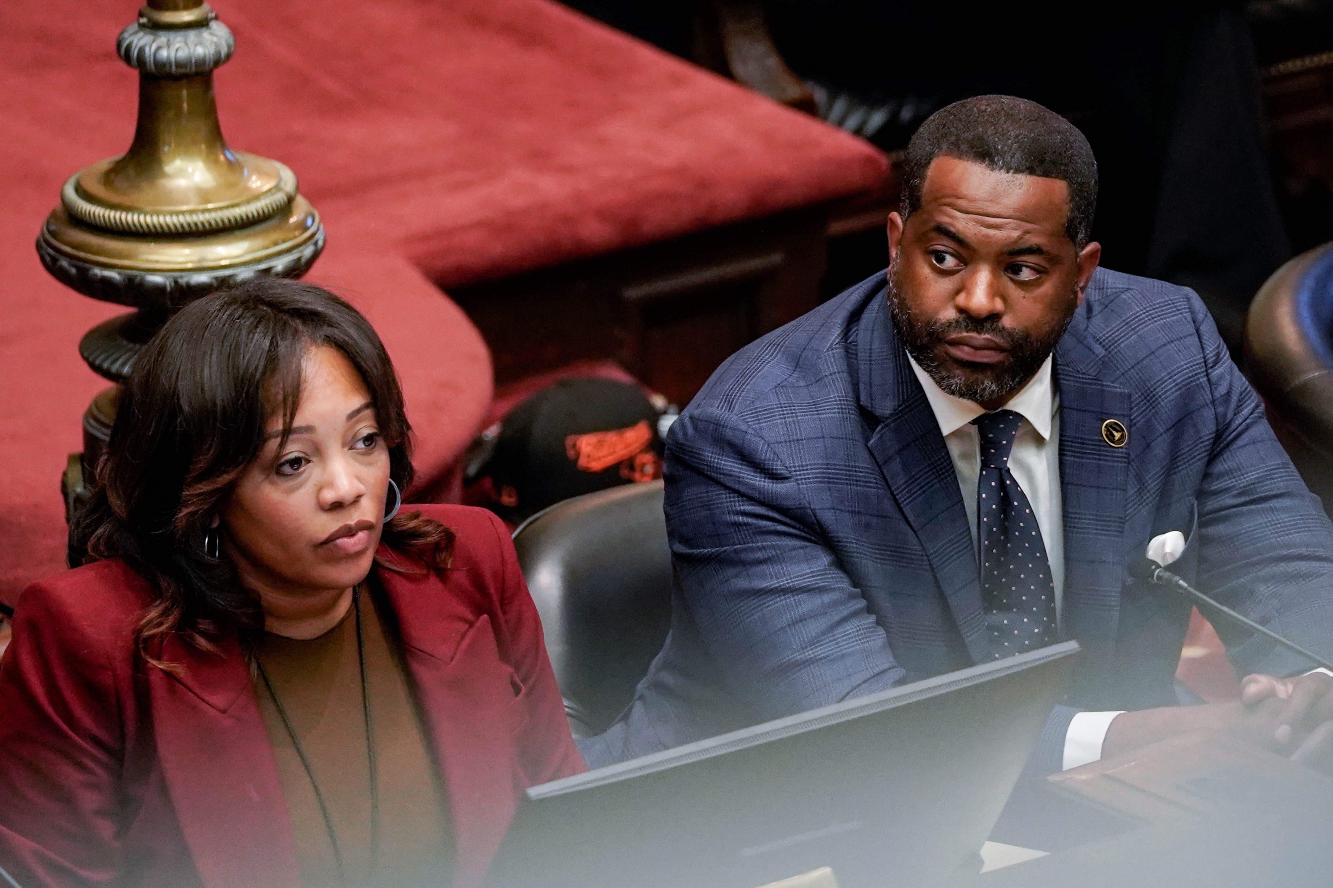 City Council President Nick Mosby, right, looks on seated while seated next to Councilwoman Phylicia Porter at the Baltimore City Council hearing on the Brooklyn shooting.