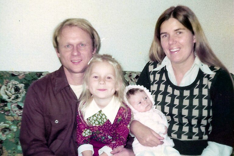 Robert Lewand, holding his daughter, Beth, and his wife Karen, holding his daughter, Stephanie, in 1975.