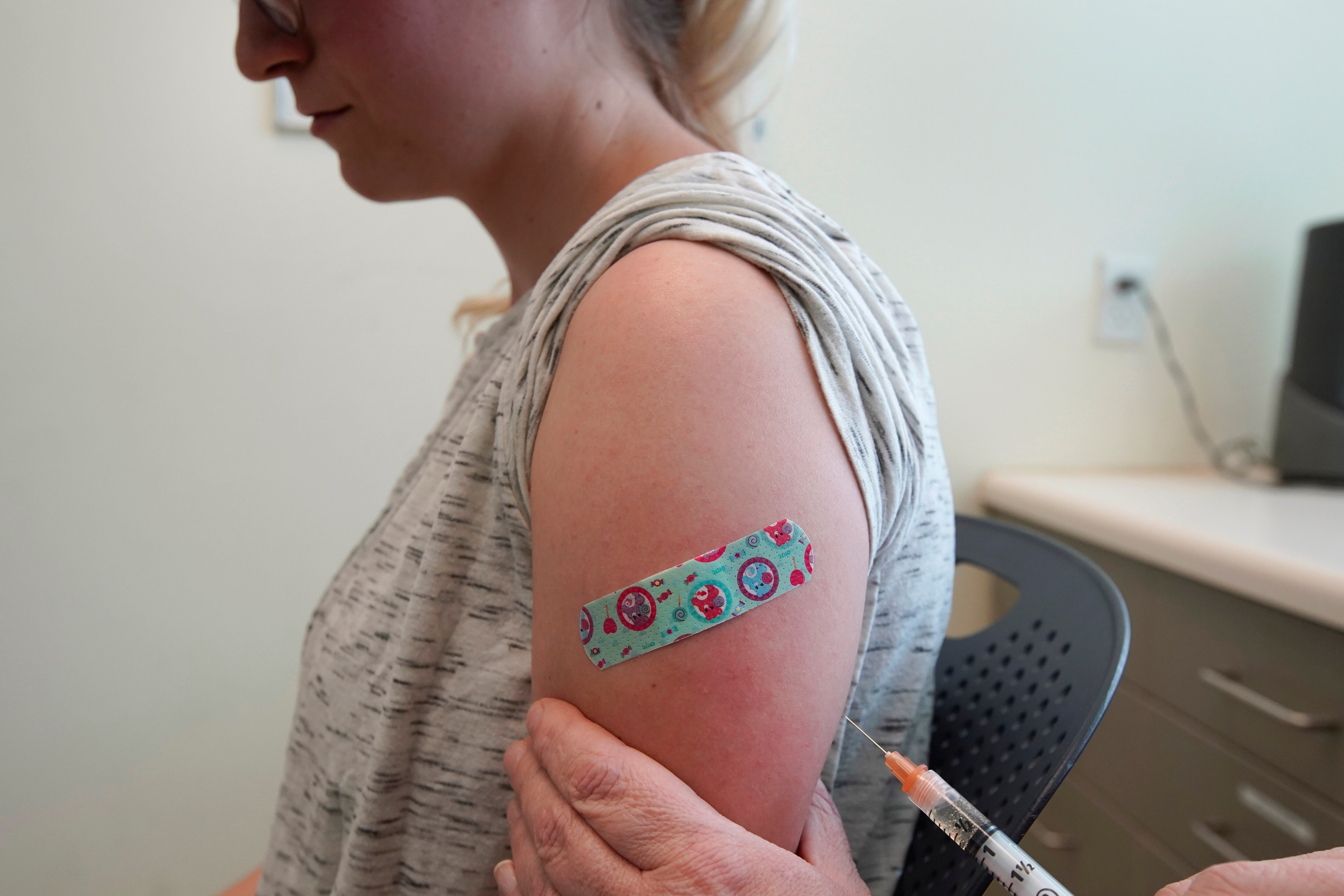 PROVO, UT - APRIL 29: A nurse gives Michaella a measles, mumps and rubella virus vaccine made by Merck at the Utah County Health Department on April 29, 2019 in Provo, Utah. These were Michaella's first ever vaccinations. She asked that only her first name be used.