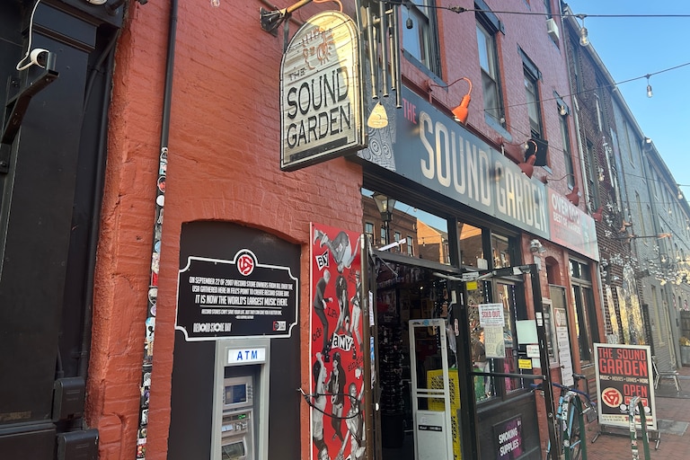Dozens lined up to see John Legend at the Sound Garden in Fells Point, wrapping around Thames Street before the 6 p.m. start.