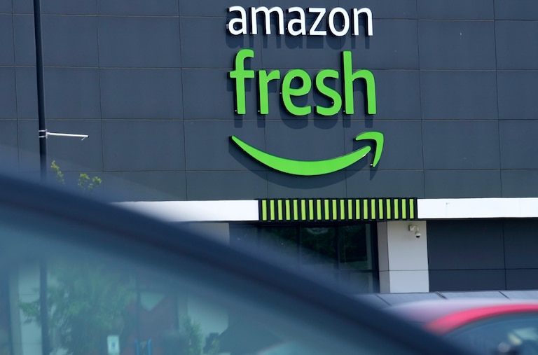 Amazon fresh market sign is seen in Naperville, Ill., Thursday, June 8, 2023. (AP Photo/Nam Y. Huh)
