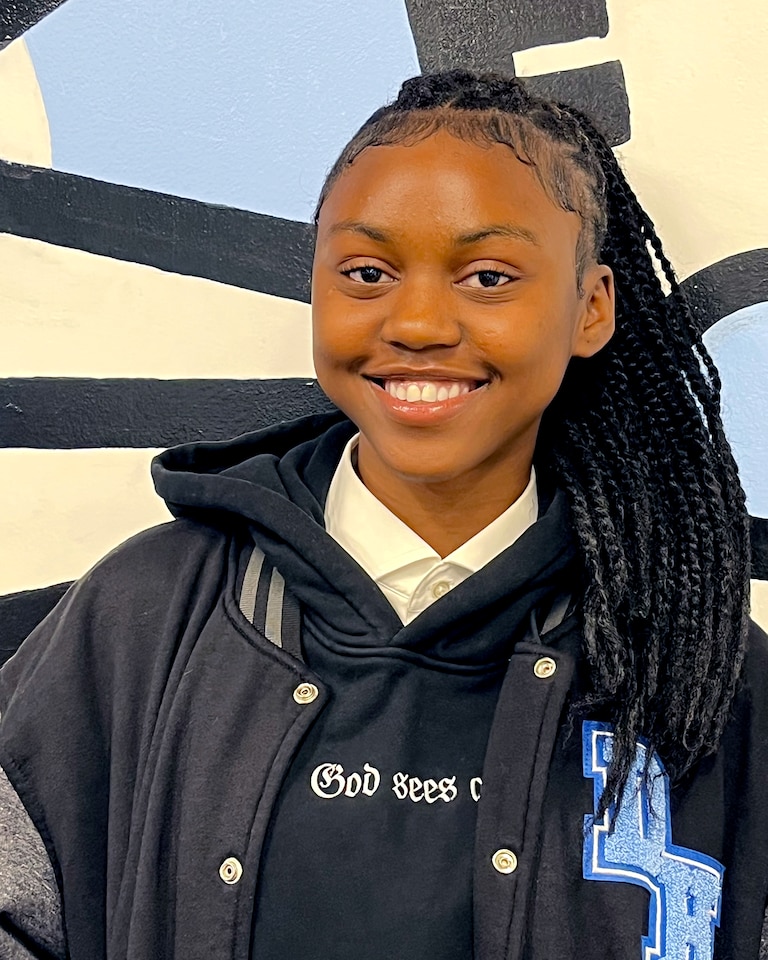 Grace Nyembo, a junior at Digital, typically transfers twice on her way to school from Park Heights.