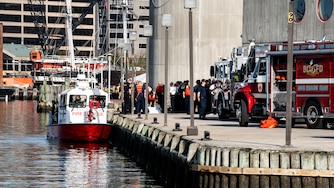 Baltimore City Fire and Police respond to Pier 4 on Tuesday.