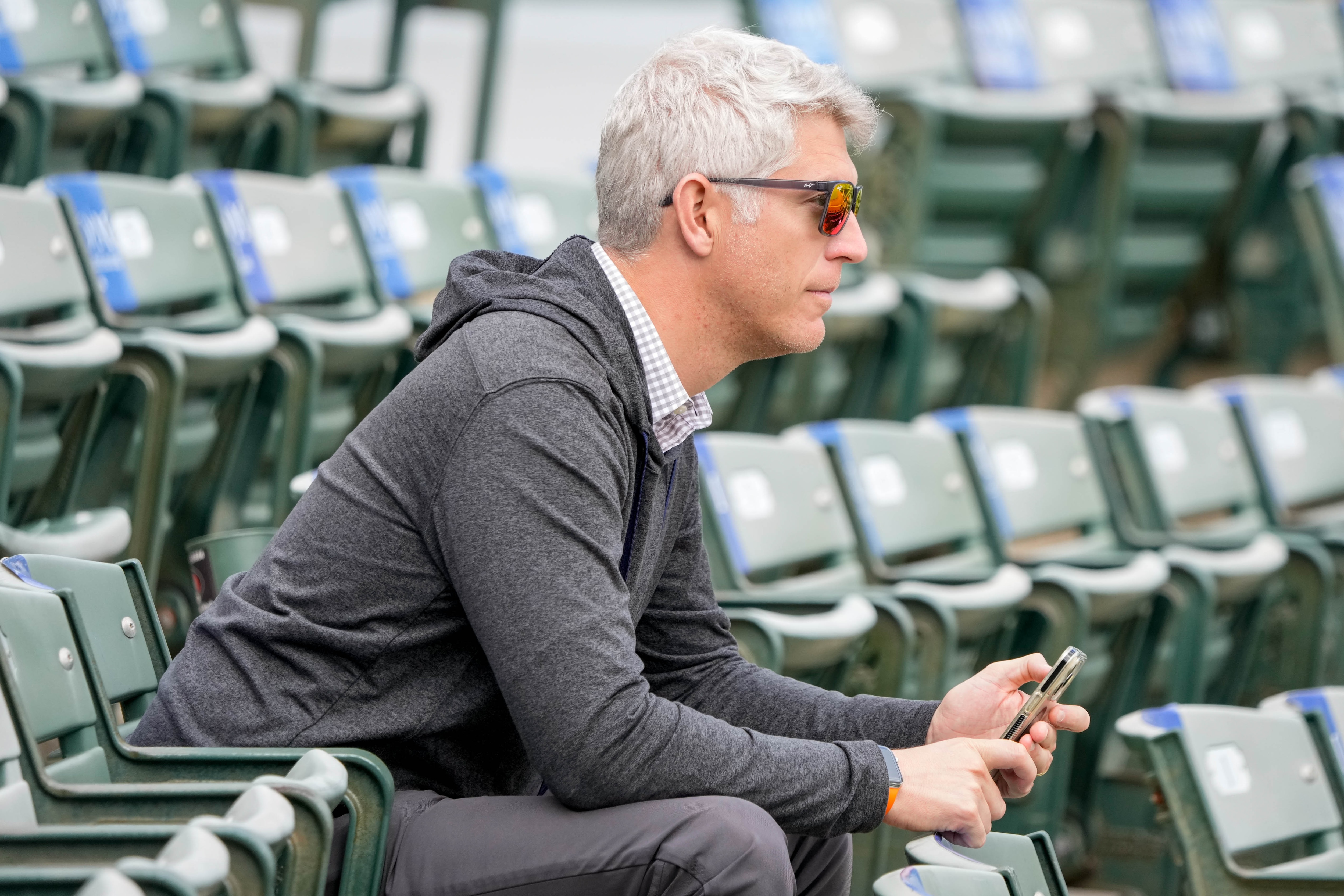 General manager Mike Elias observes batting practice at Ed Smith Stadium in Sarasota, Florida, in February.