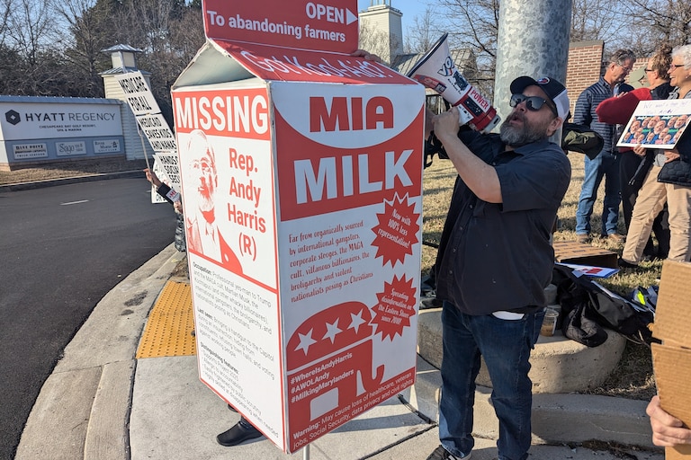 Protesters shout "Where is Andy?" at the entrance to the Hyatt Regency Chesapeake on March 13, 2025 before U.S. Rep. Andy Harris's speech at the Dorchester County Chamber of Commerce annual meeting in Cambridge