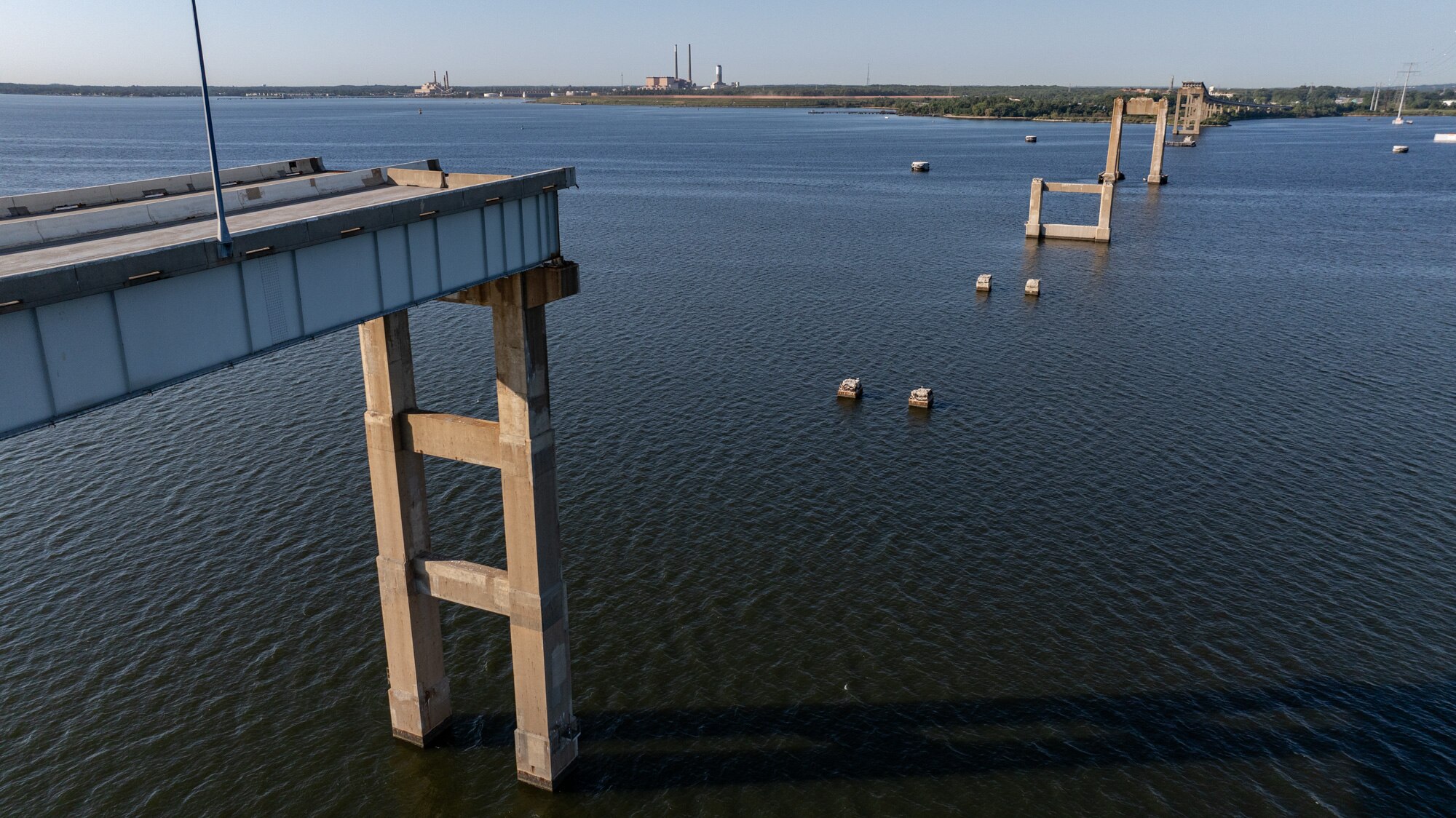 Under a proposed plan, construction of the replacement Key Bridge would be completed by barge and via temporary piers that jut into the Patapsco River.