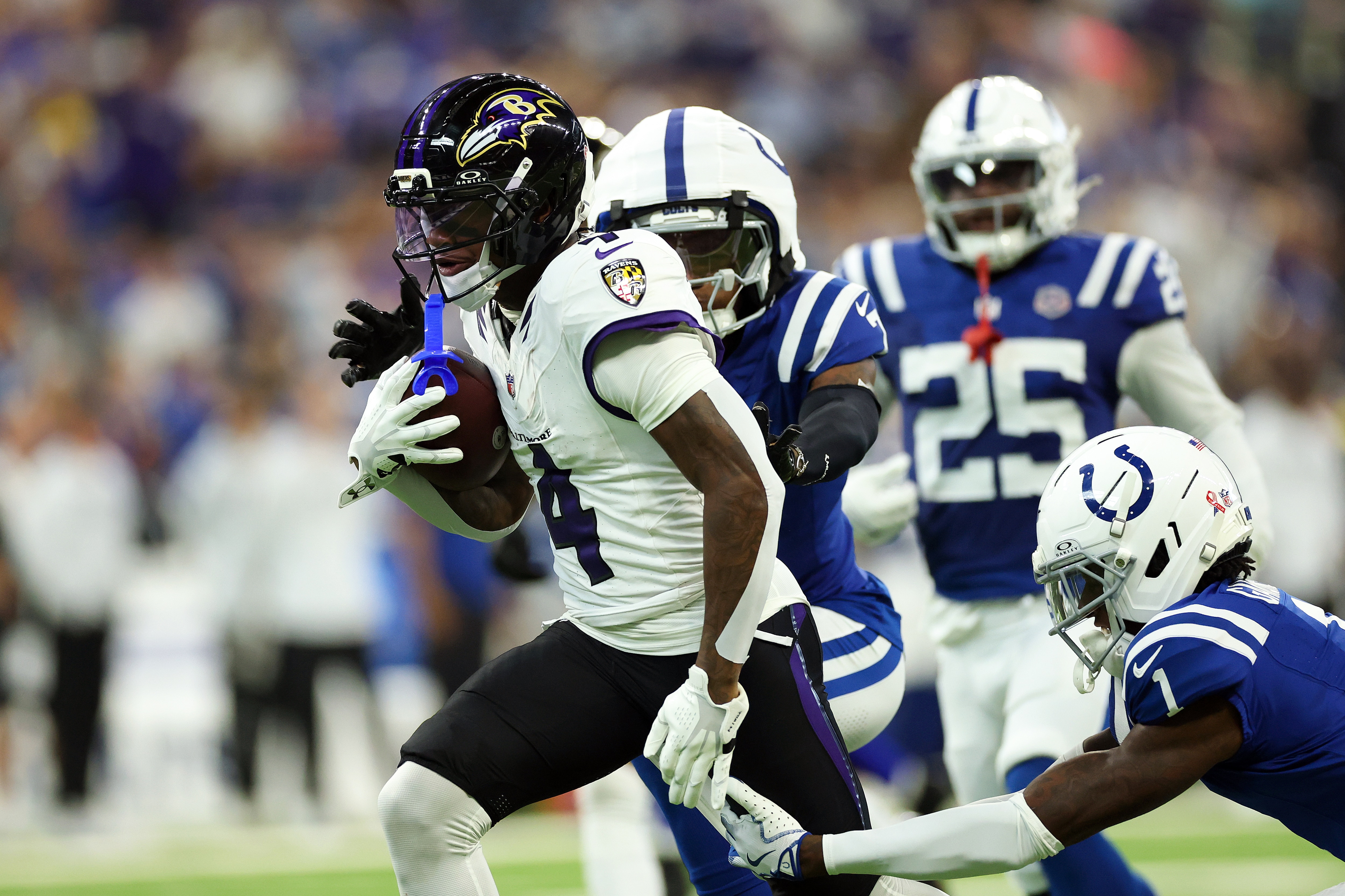 Ravens receiver Zay Flowers runs for a touchdown after catching a pass in the second quarter Sunday in Indianapolis.