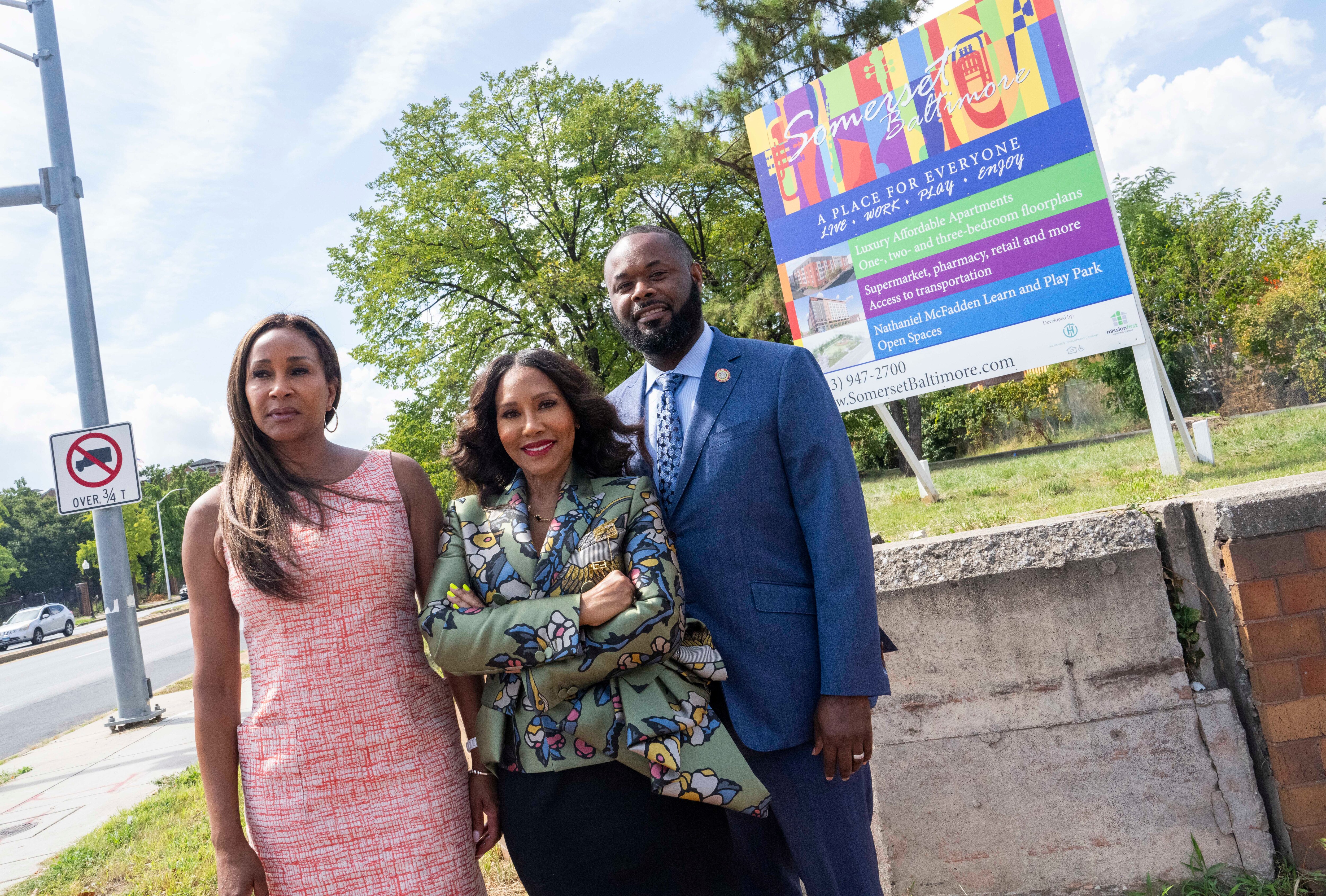 Janet Abrahams, CEO of the Housing Authority of Baltimore City, Dana Henson, developer, and state Sen. Cory McCray stand at the corner of Orleans Street and North Central Avenue in September. The team has signed a deal with Lidl to anchor redevelopment of the Perkins-Somerset-Oldtown project.