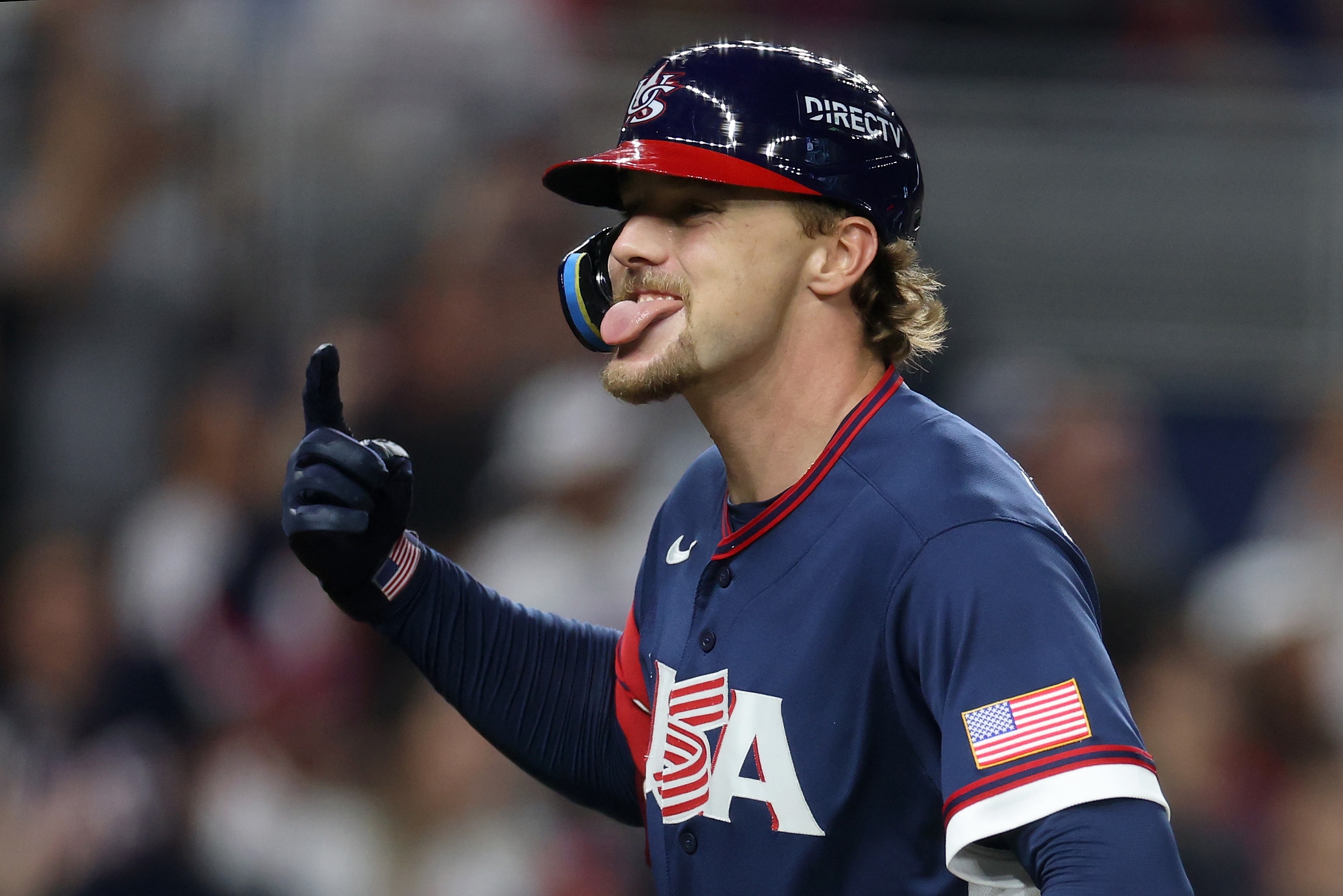 Gunnar Henderson enjoys his solo home run against Team Dominican Republic during the fourth inning Sunday night in Miami.