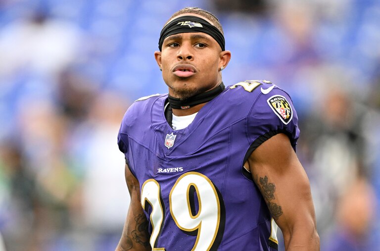 Baltimore Ravens safety Ar'Darius Washington looks on during pre-game warm-ups before an NFL football game against the Philadelphia Eagles, Friday, Aug. 9, 2024, in Baltimore. (AP Photo/Terrance Williams)