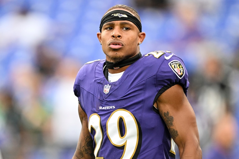 Baltimore Ravens safety Ar'Darius Washington looks on during pre-game warm-ups before an NFL football game against the Philadelphia Eagles, Friday, Aug. 9, 2024, in Baltimore. (AP Photo/Terrance Williams)