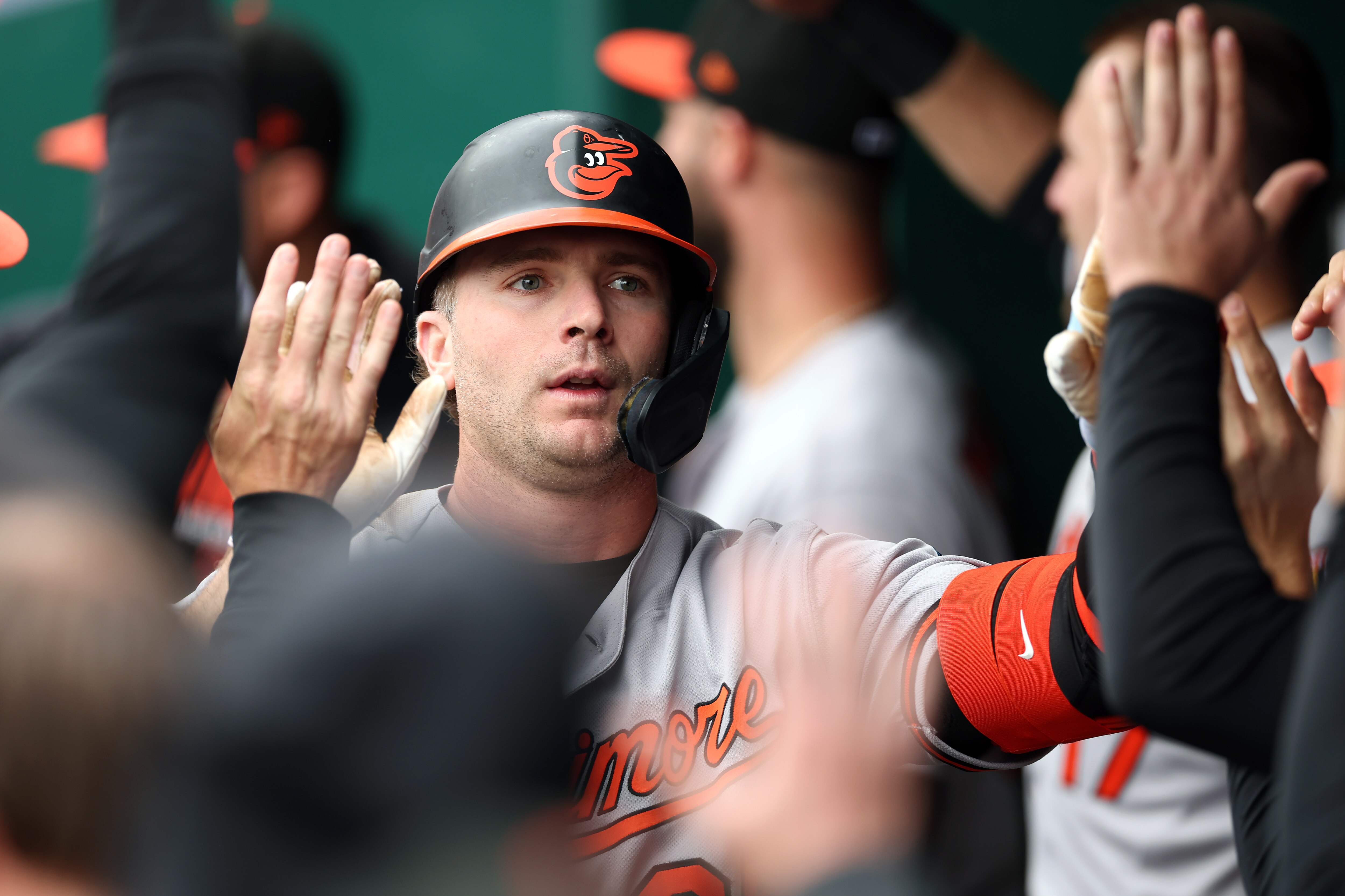 KANSAS CITY, MISSOURI - APRIL 22: Pete Alonso #25 of the Baltimore Orioles is congratulated by teammates in the dugout after hitting a two-run home run during the 1st inning of the game against the Kansas City Royals at Kauffman Stadium on April 22, 2026 in Kansas City, Missouri.
