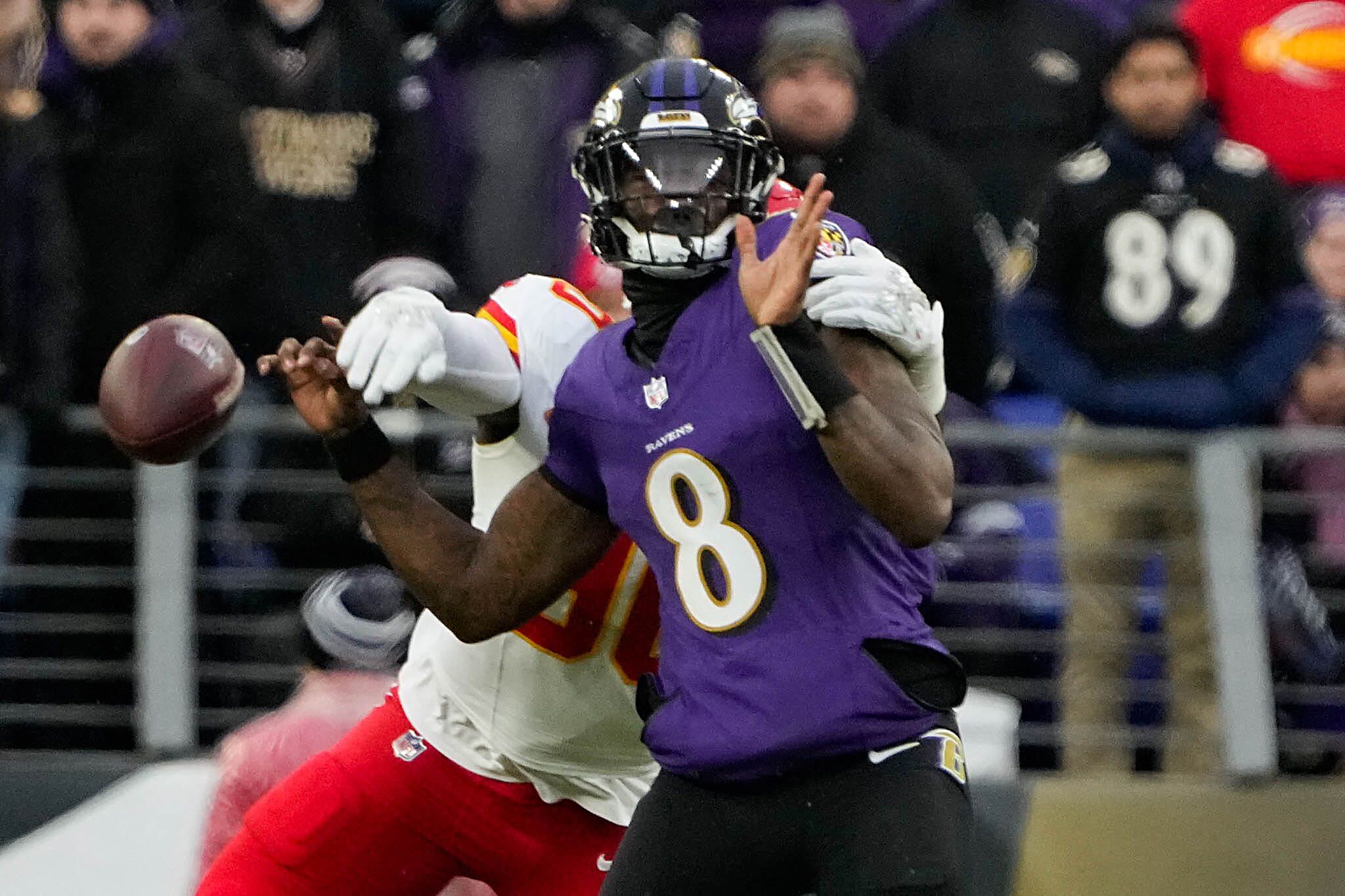 Kansas City's Charles Omenihu strips Ravens quarterback Lamar Jackson of the ball on a first-half sack during the AFC championship game Sunday.
