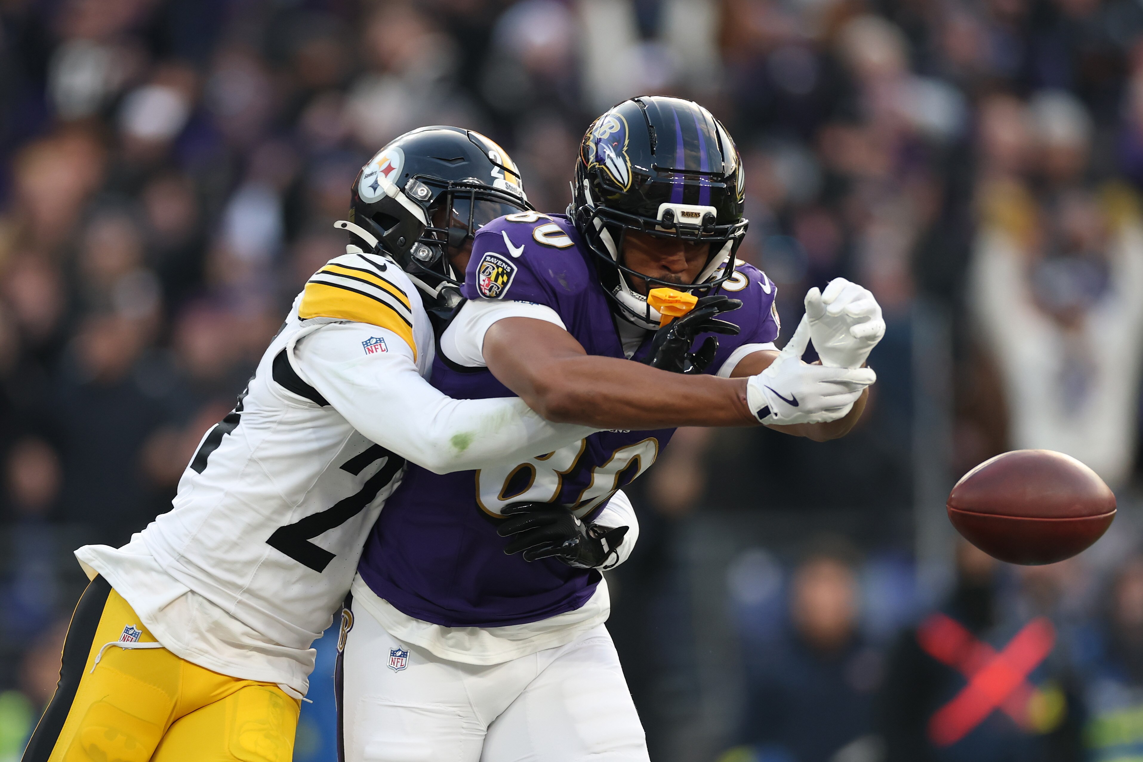 BALTIMORE, MARYLAND - DECEMBER 07: Joey Porter Jr. #24 of the Pittsburgh Steelers breaks up a pass intended for Isaiah Likely #80 of the Baltimore Ravens during the fourth quarter at M&T Bank Stadium on December 07, 2025 in Baltimore, Maryland.