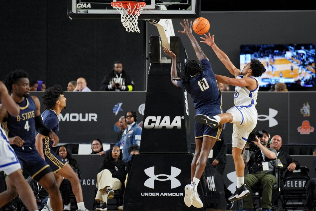 Fayetteville State’s Romeo Aquino (10) scores over Bluefield State’s Anthony Latty (10) in the first half of the CIAA Men’s championship game in Baltimore, Md., on Saturday, February 28, 2026.