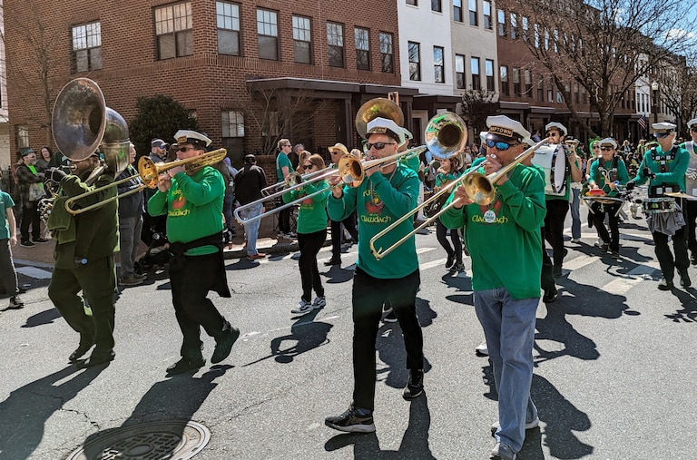 Naptown Brass, a New Orleans style band better known for Mardi Gras, marches in the Annapolis St. Patrick's Parade on March 17, 2024.