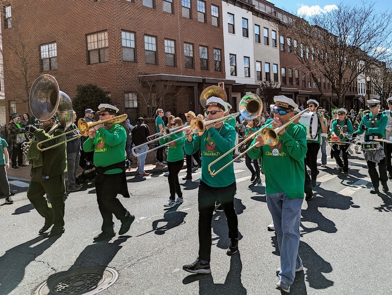 Naptown Brass, a New Orleans style band better known for Mardi Gras, marches in the Annapolis St. Patrick's Parade on March 17, 2024.